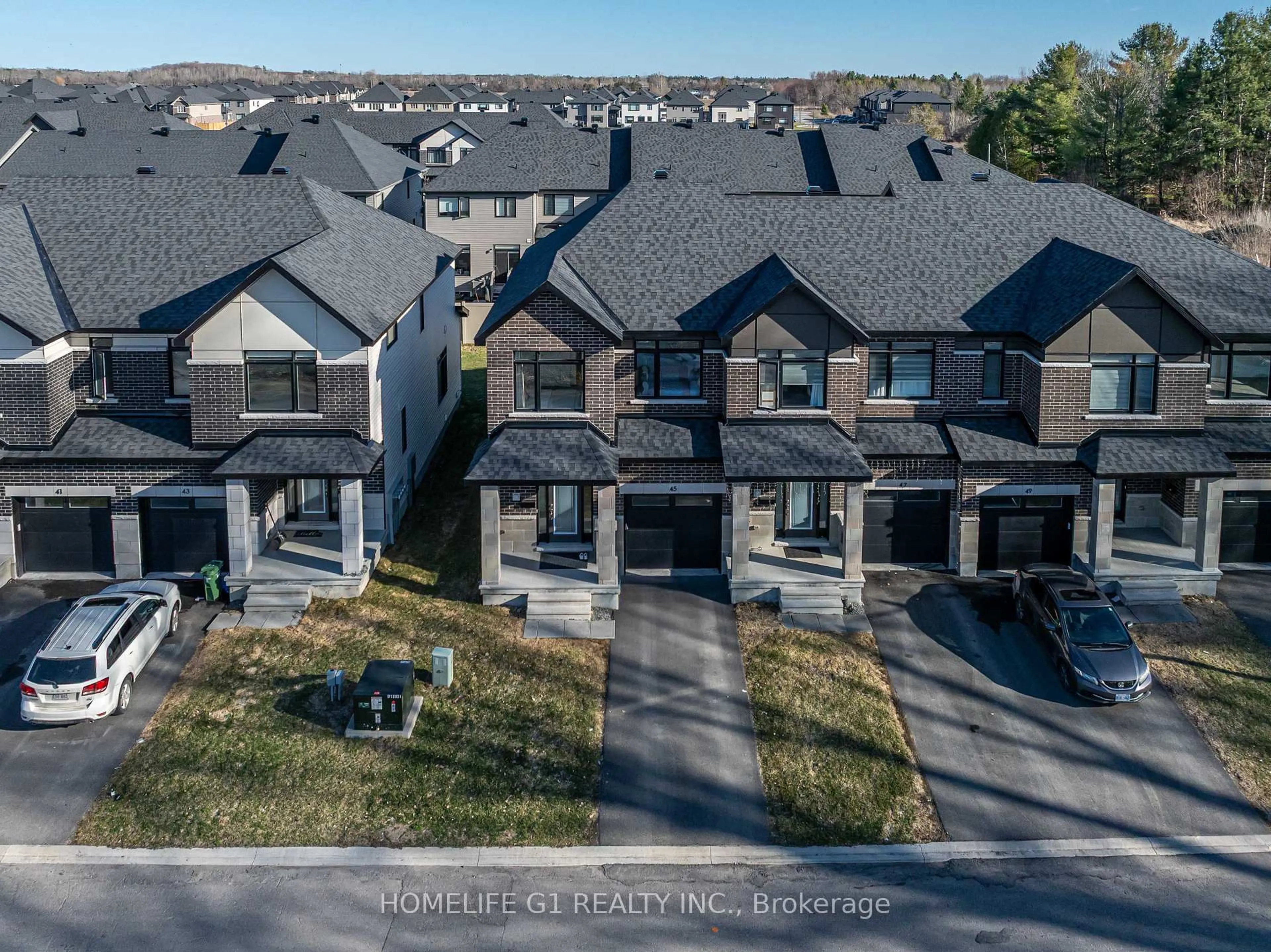 A pic from outside/outdoor area/front of a property/back of a property/a pic from drone, mountain view for 45 Moosonee Cres, Ottawa Ontario K4M 0M1