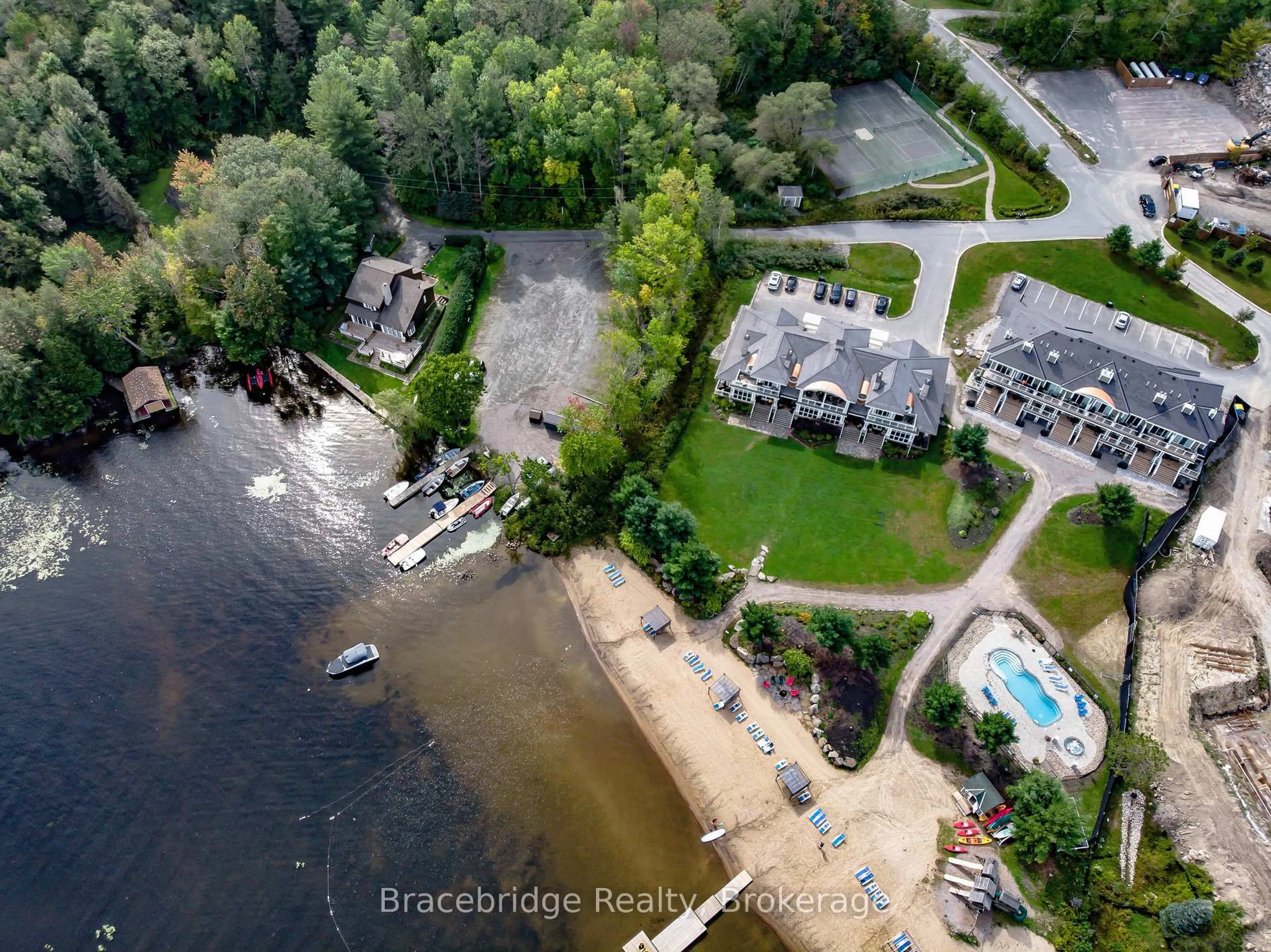 A pic from outside/outdoor area/front of a property/back of a property/a pic from drone, water/lake/river/ocean view for 1869 Muskoka Rd 118 Highway #BHV-C101-A&B, Muskoka Lakes Ontario P1L 1W8