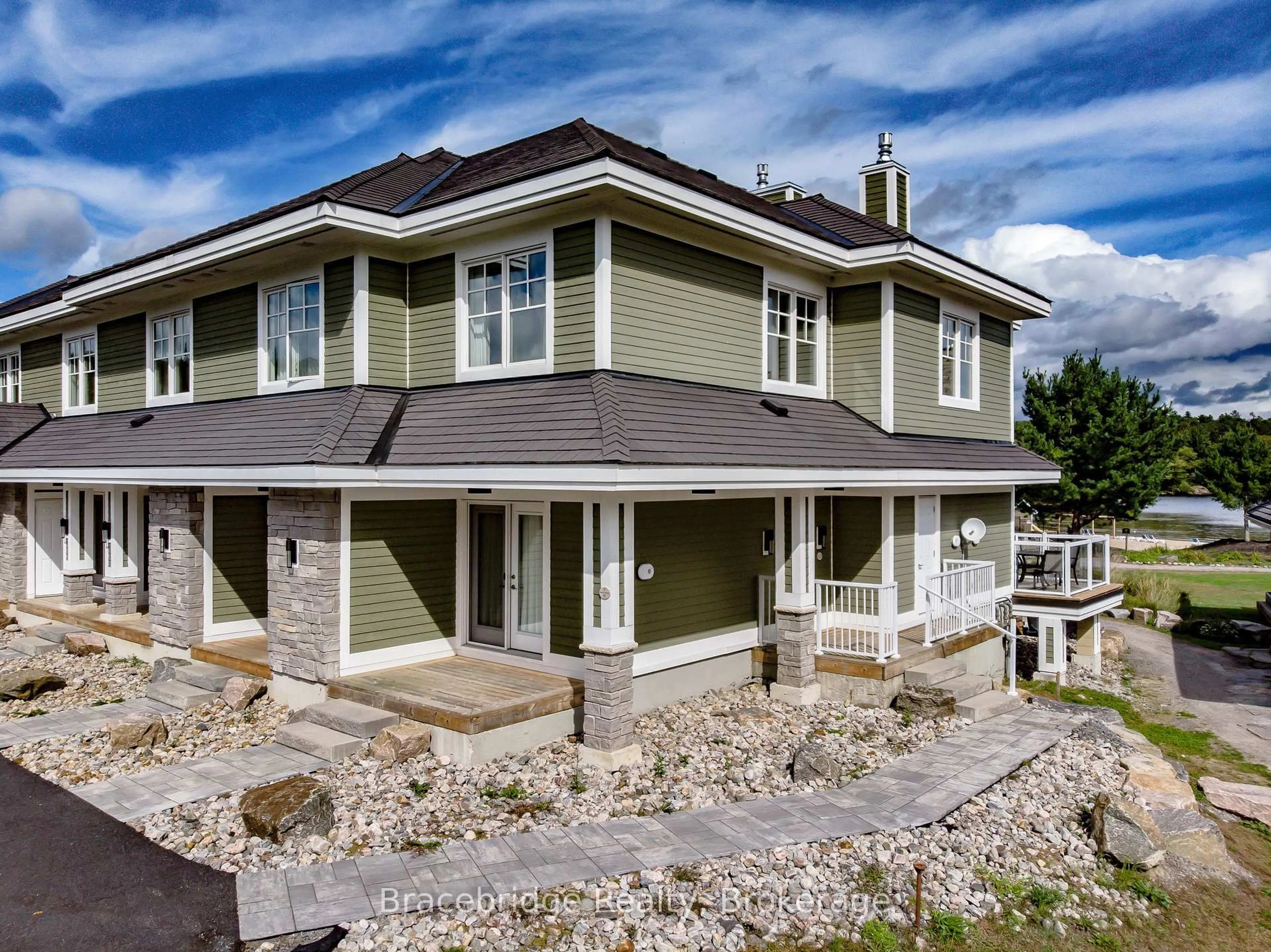 Home with vinyl exterior material, unknown for 1869 Muskoka Rd 118 Highway #BHV-C101-A&B, Muskoka Lakes Ontario P1L 1W8