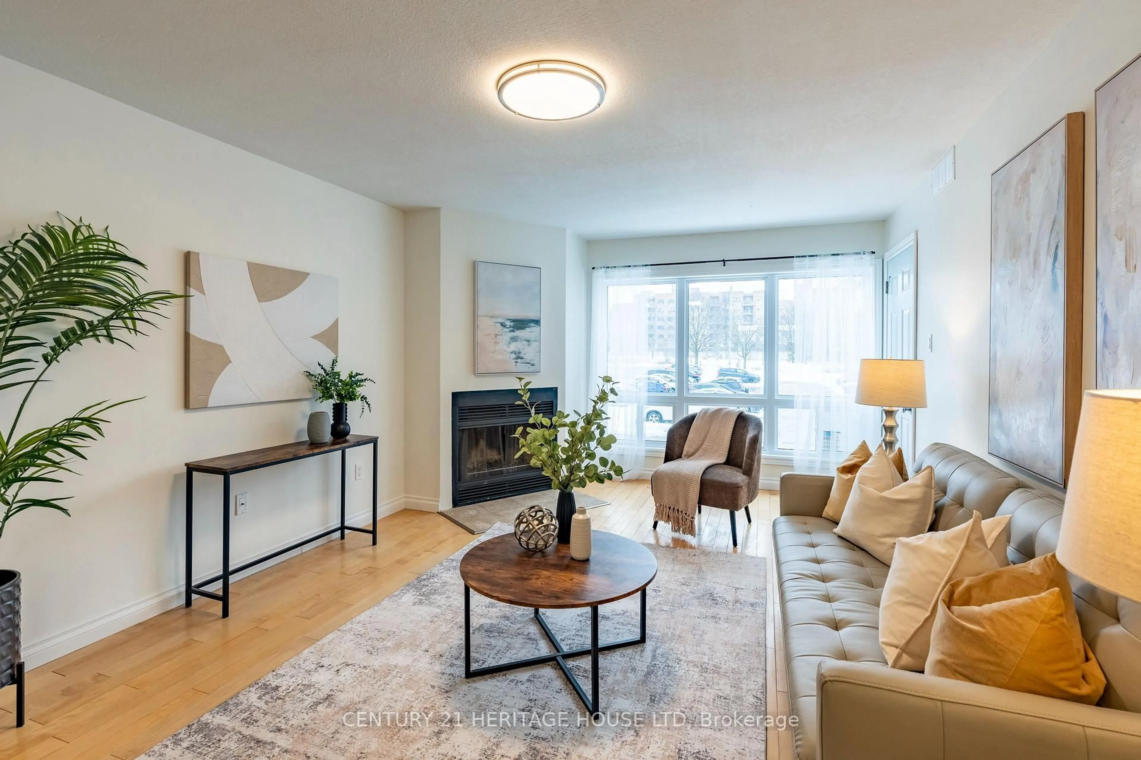 Living room with furniture, wood/laminate floor for 15 Hofstetter Ave #208, Kitchener Ontario N2A 3Z7