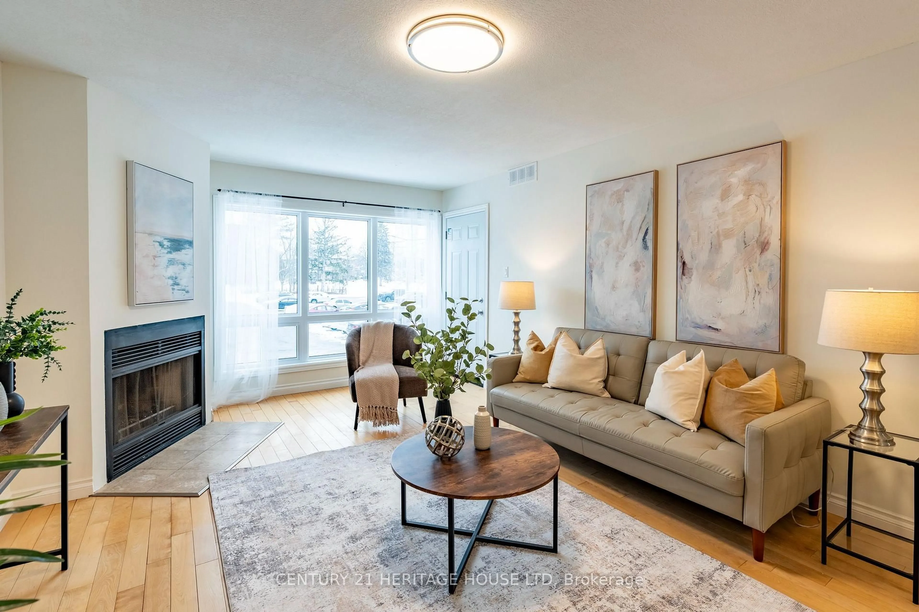 Living room with furniture, wood/laminate floor for 15 Hofstetter Ave #208, Kitchener Ontario N2A 3Z7