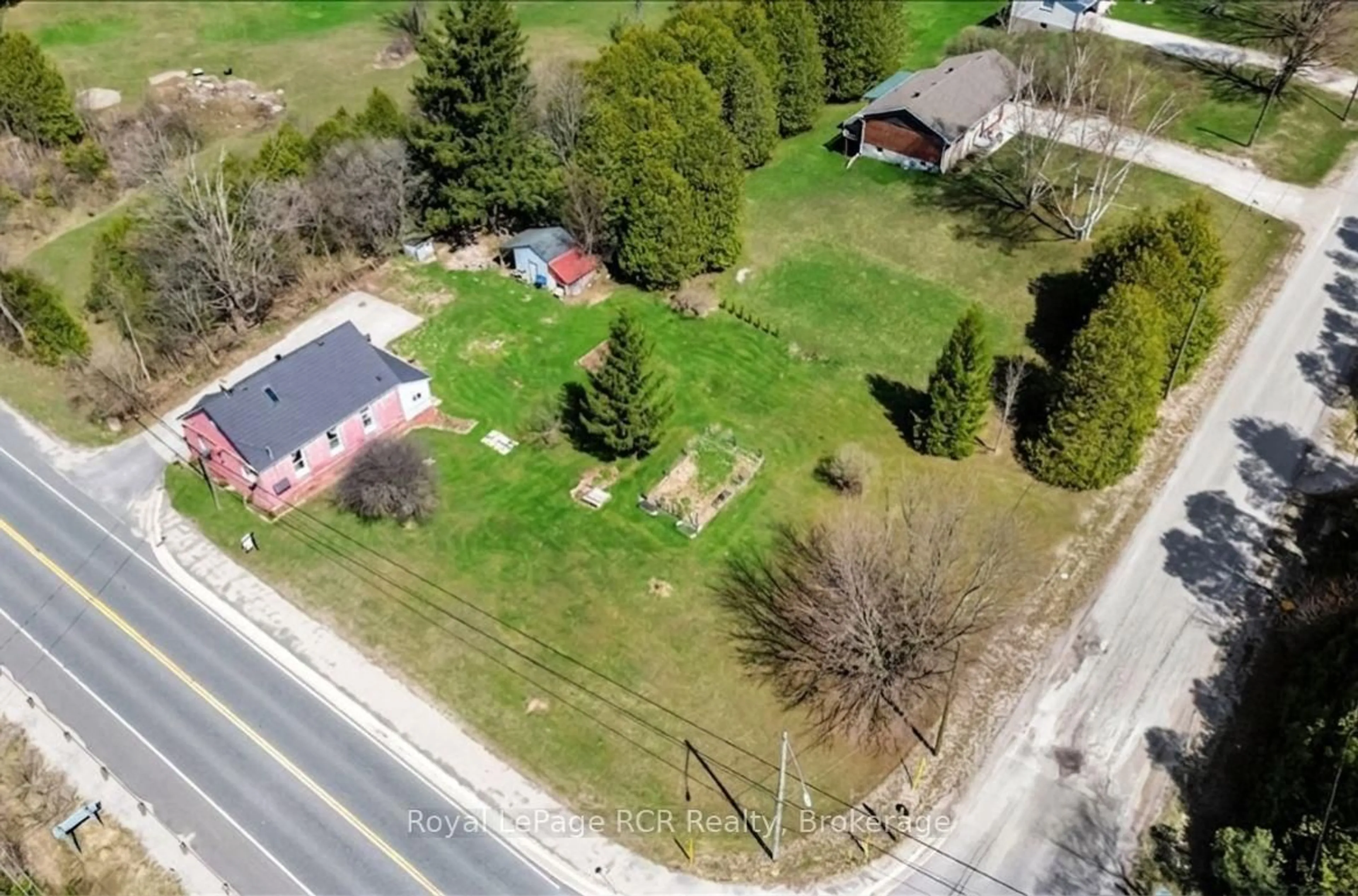 A pic from outside/outdoor area/front of a property/back of a property/a pic from drone, street for 718533 6 Highway, Georgian Bluffs Ontario N0H 2K0