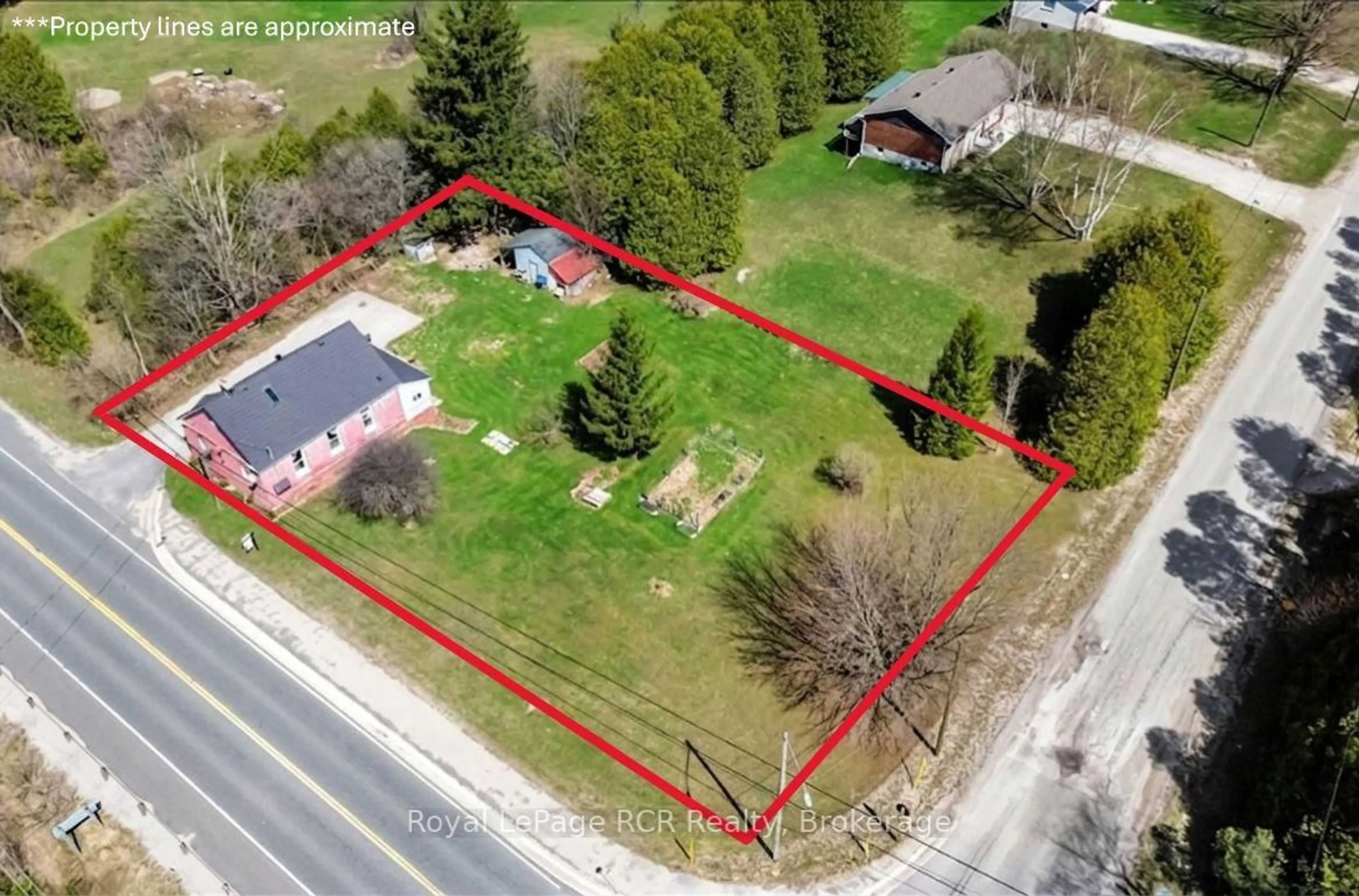 A pic from outside/outdoor area/front of a property/back of a property/a pic from drone, street for 718533 6 Highway, Georgian Bluffs Ontario N0H 2K0