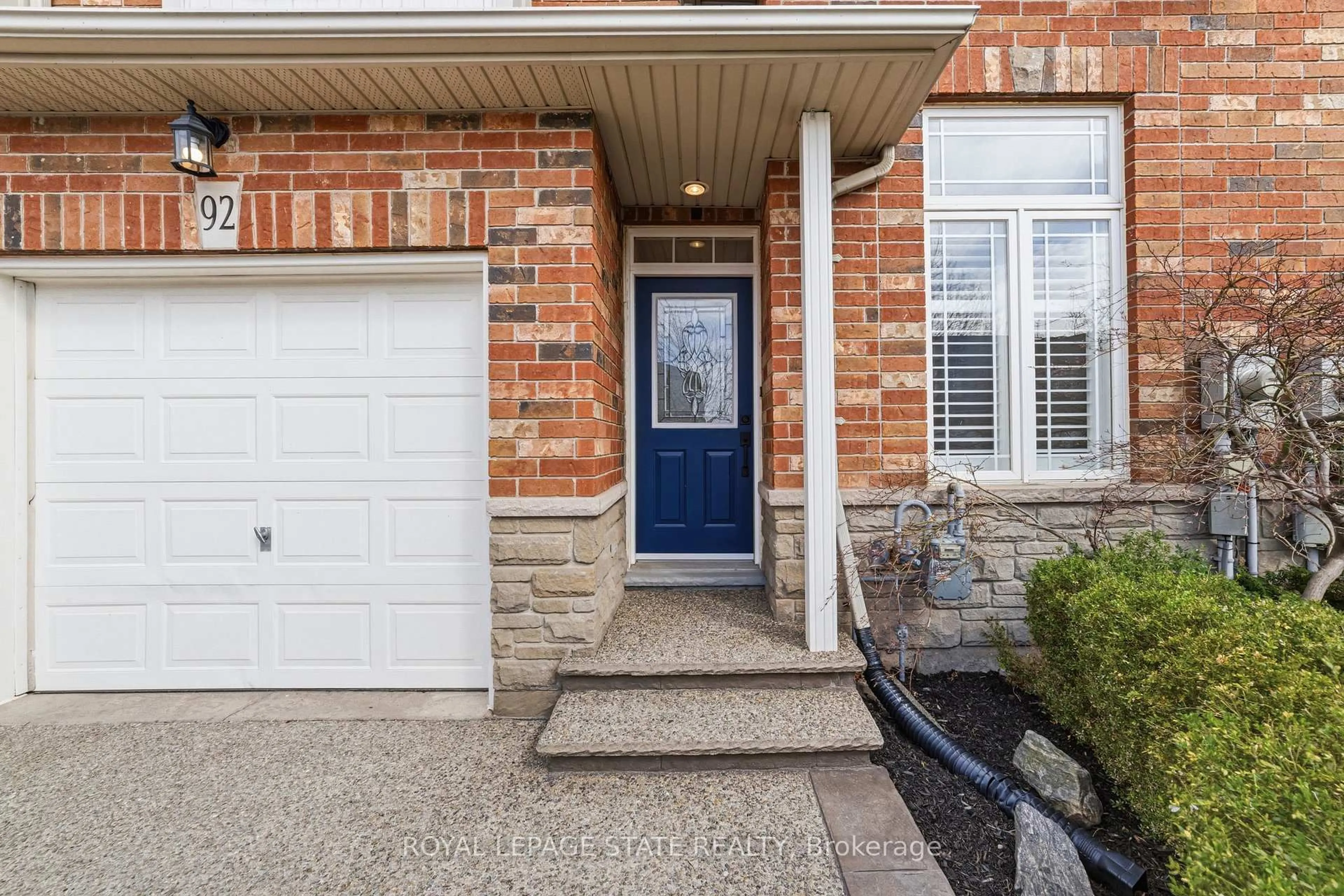 Home with brick exterior material, street for 92 Benziger Lane, Hamilton Ontario L8E 6G5