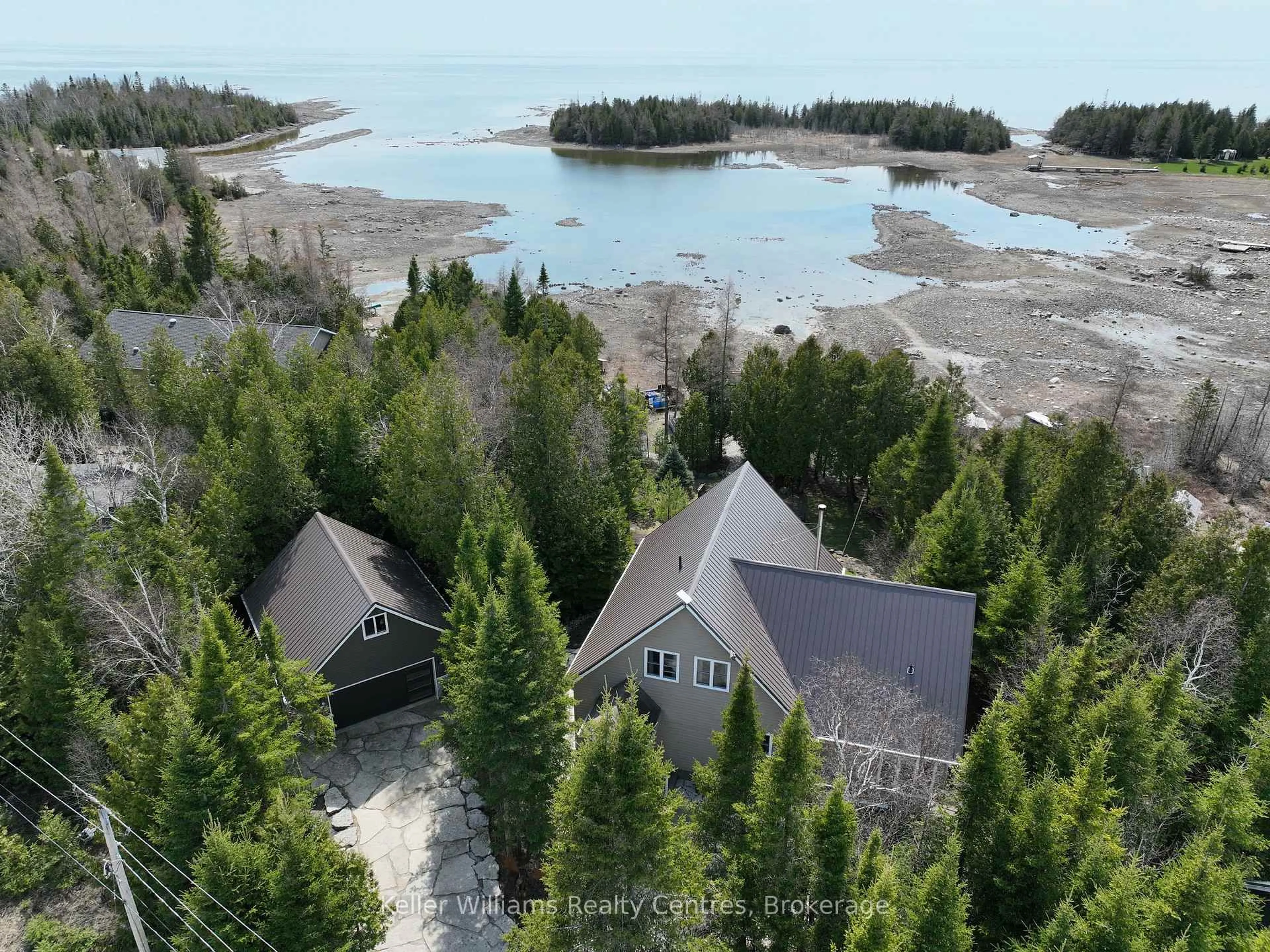 A pic from outside/outdoor area/front of a property/back of a property/a pic from drone, water/lake/river/ocean view for 55 Devil's Glen Rd, Northern Bruce Peninsula Ontario N0H 2T0