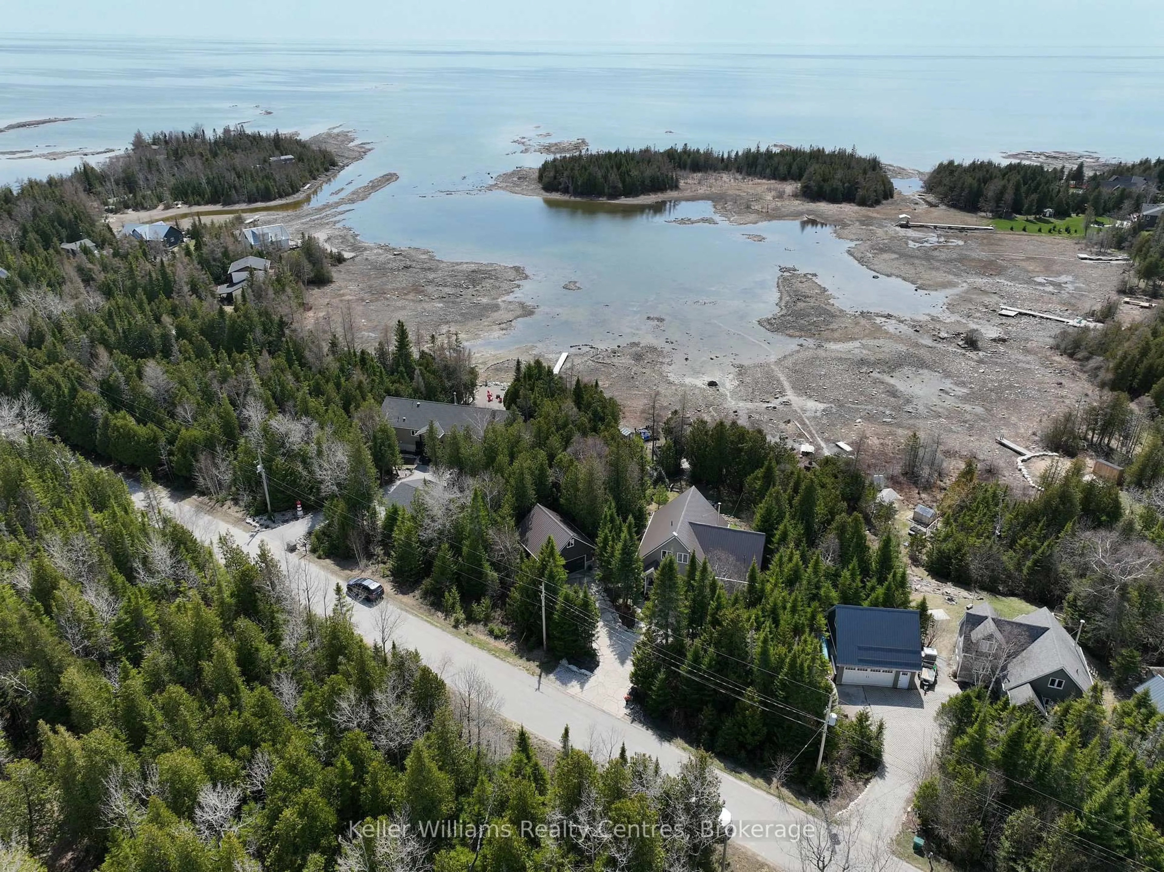 A pic from outside/outdoor area/front of a property/back of a property/a pic from drone, water/lake/river/ocean view for 55 Devil's Glen Rd, Northern Bruce Peninsula Ontario N0H 2T0