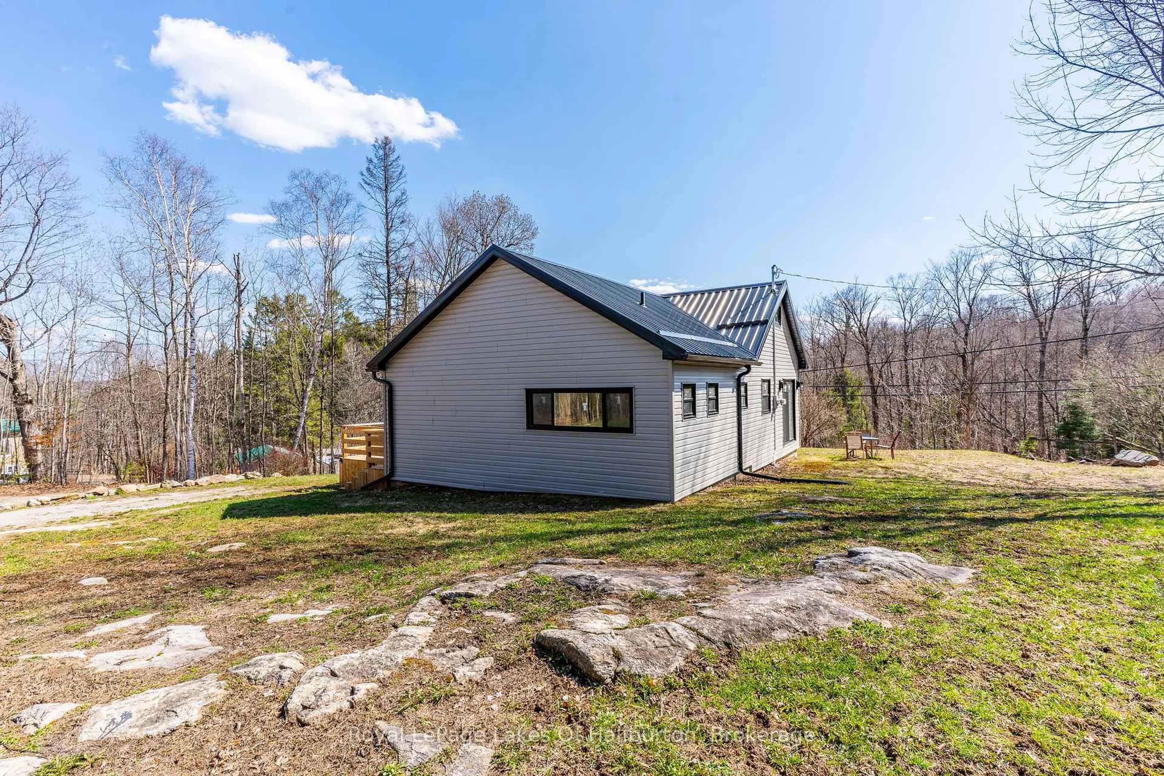 A pic from outside/outdoor area/front of a property/back of a property/a pic from drone, building for 10531 County Road 503, Highlands East Ontario K0M 1R0