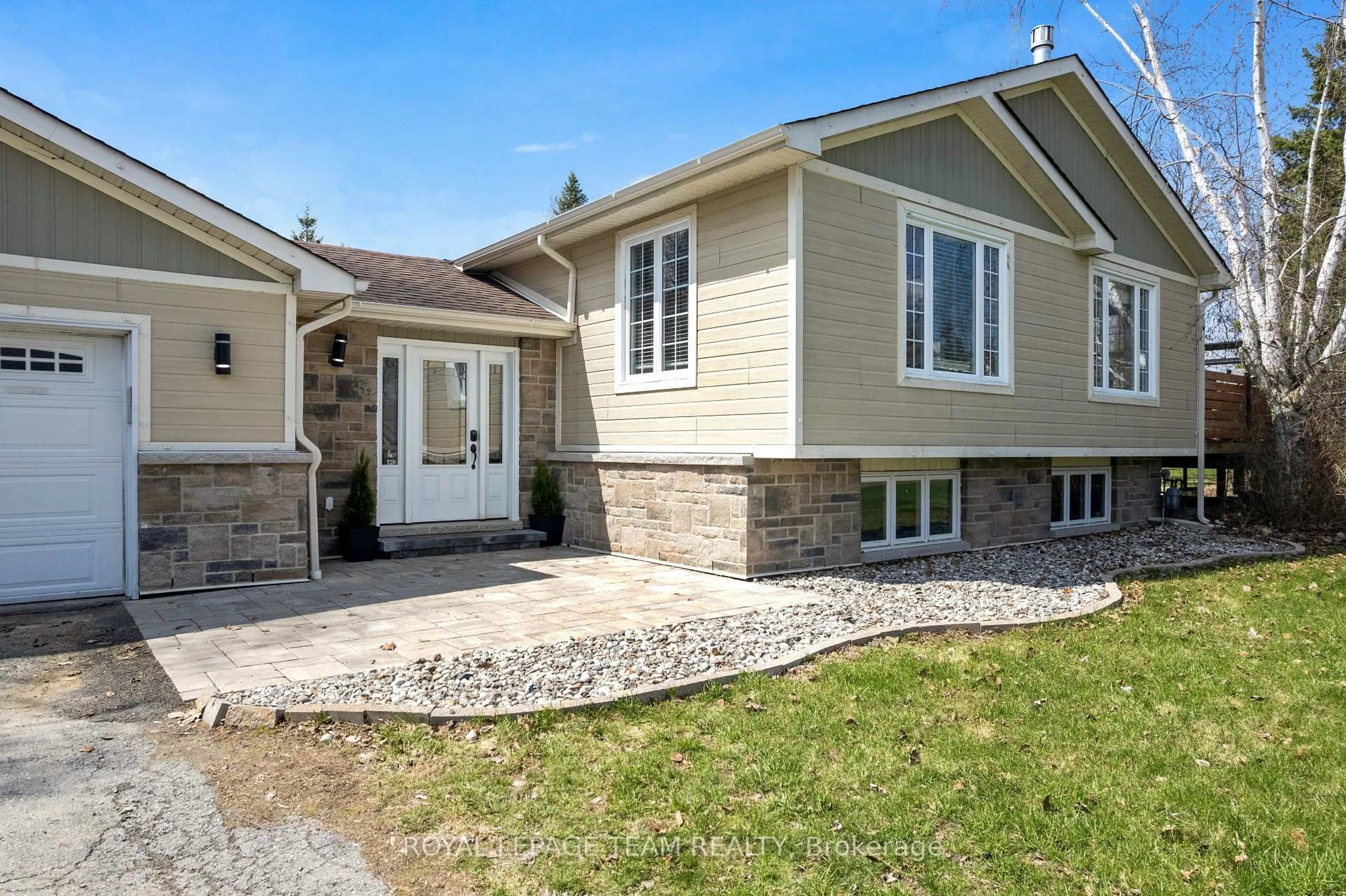 Home with vinyl exterior material, street for 18 Harmony Way, North Grenville Ontario K0G 1J0