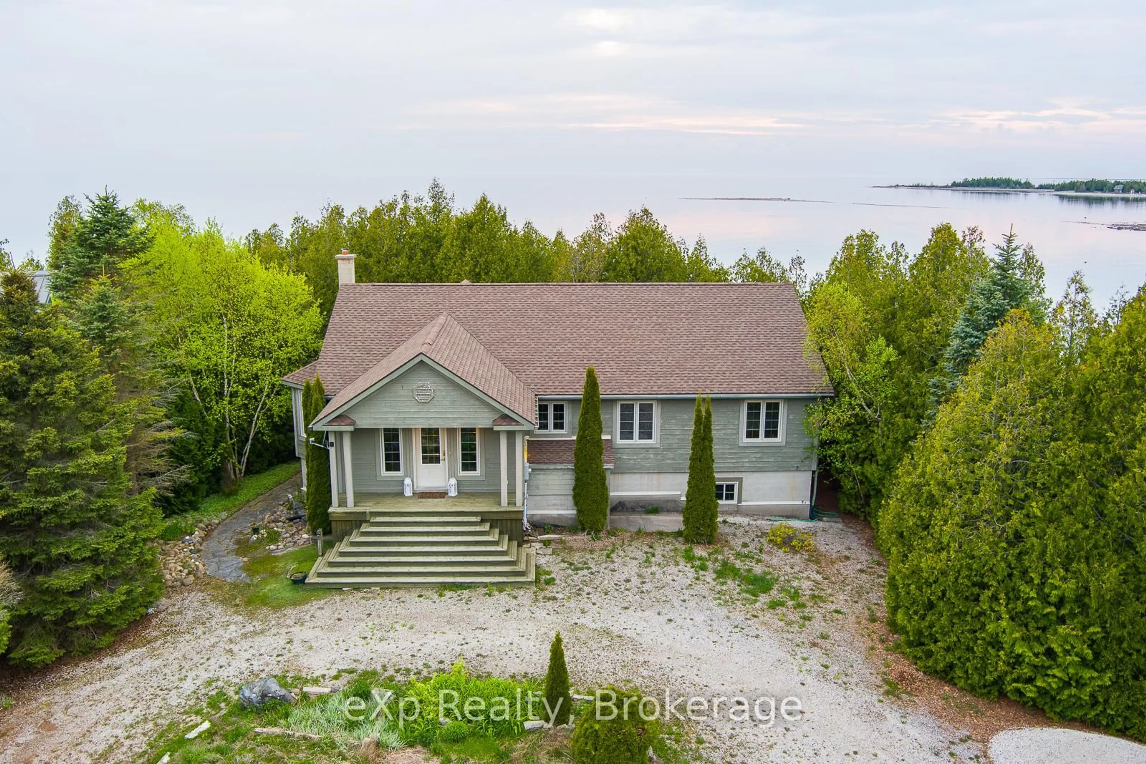 A pic from outside/outdoor area/front of a property/back of a property/a pic from drone, water/lake/river/ocean view for 61 FOX Tr, Northern Bruce Peninsula Ontario N0H 1Z0