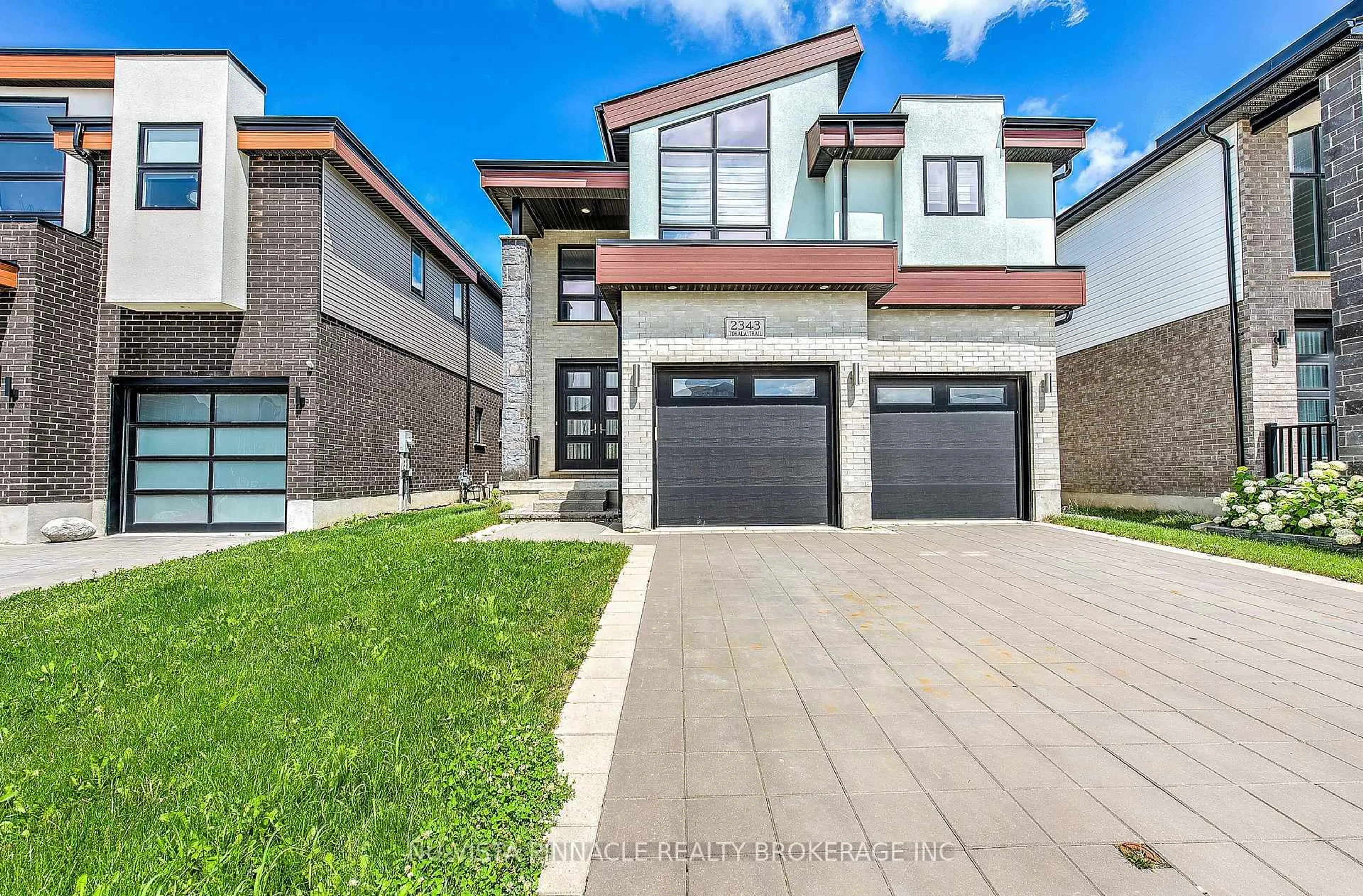 Home with brick exterior material, street for 2343 TOKALA Tr, London North Ontario N6G 0V6