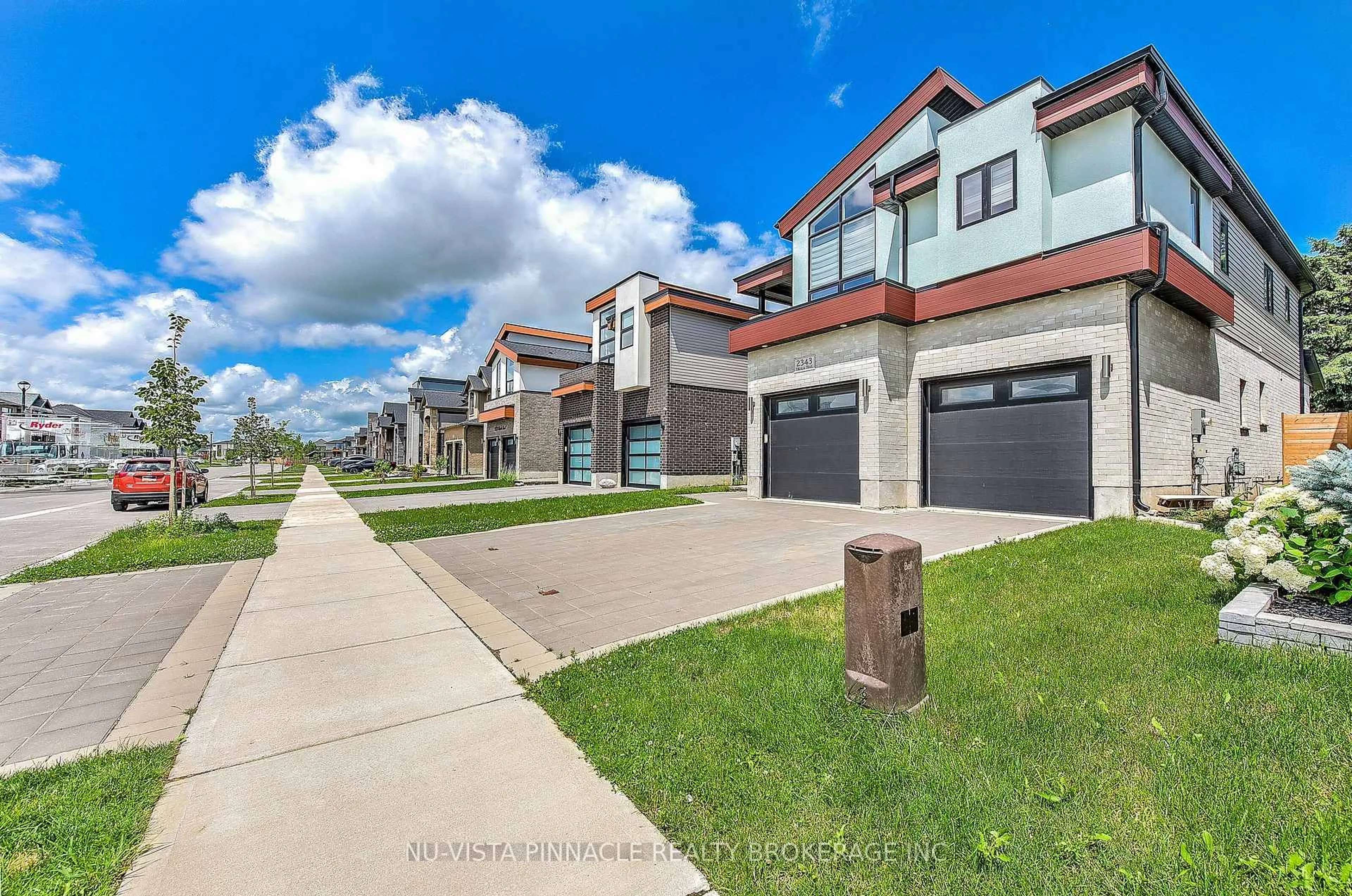 A pic from outside/outdoor area/front of a property/back of a property/a pic from drone, street for 2343 TOKALA Tr, London North Ontario N6G 0V6