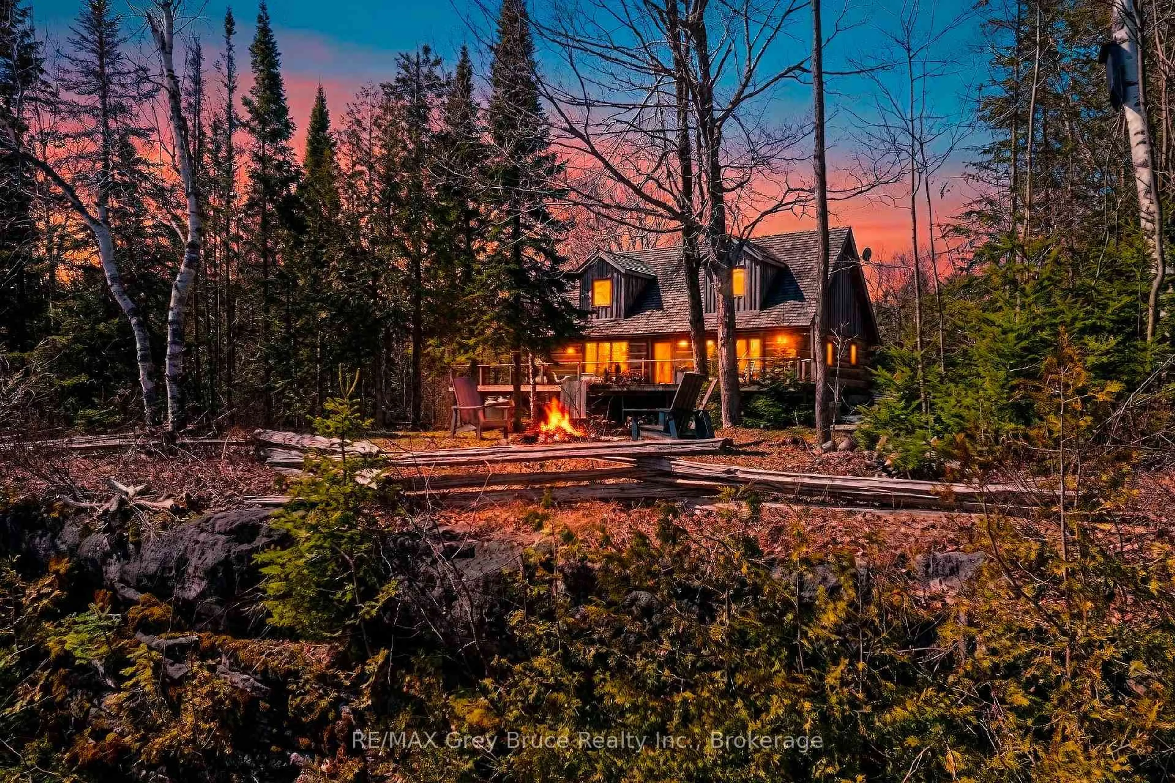 A pic from outside/outdoor area/front of a property/back of a property/a pic from drone, unknown for 126 McKague Rd, Northern Bruce Peninsula Ontario N0H 1W0