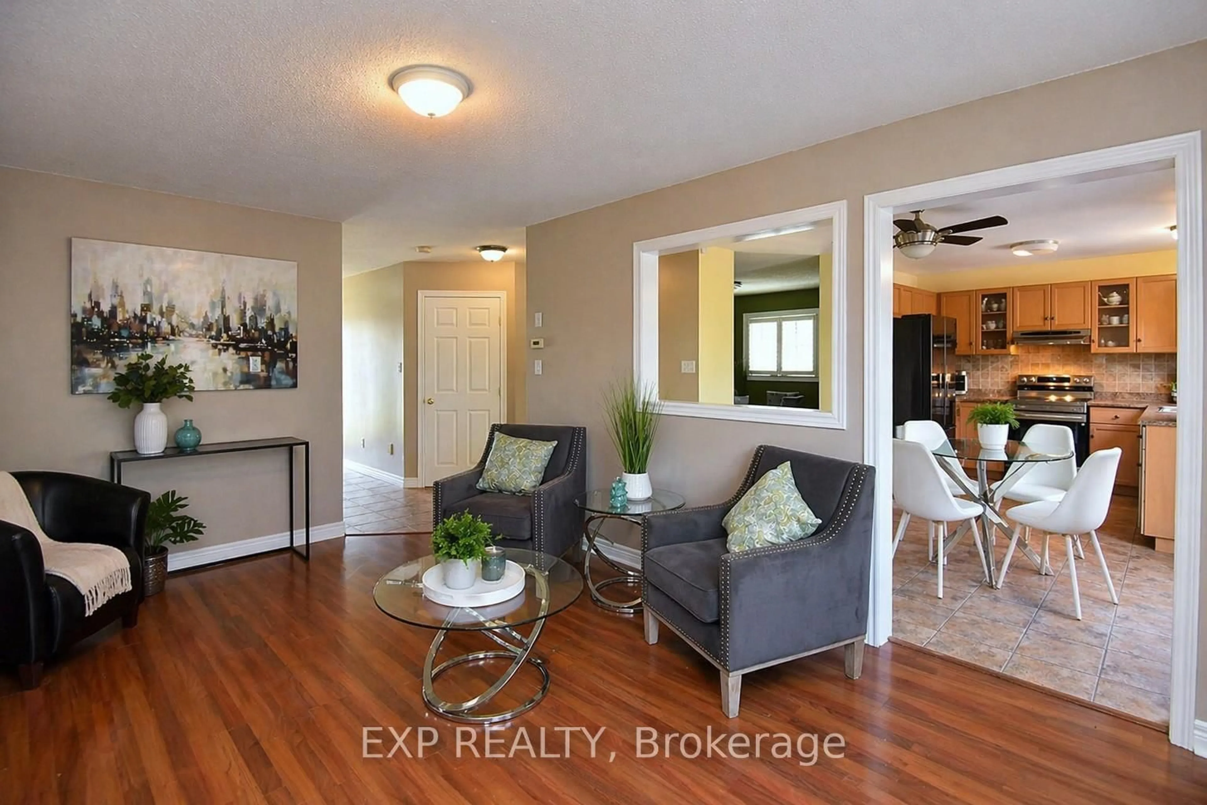 Living room with furniture, wood/laminate floor for 72 Etherington Cres, Hamilton Ontario L0R 1C0