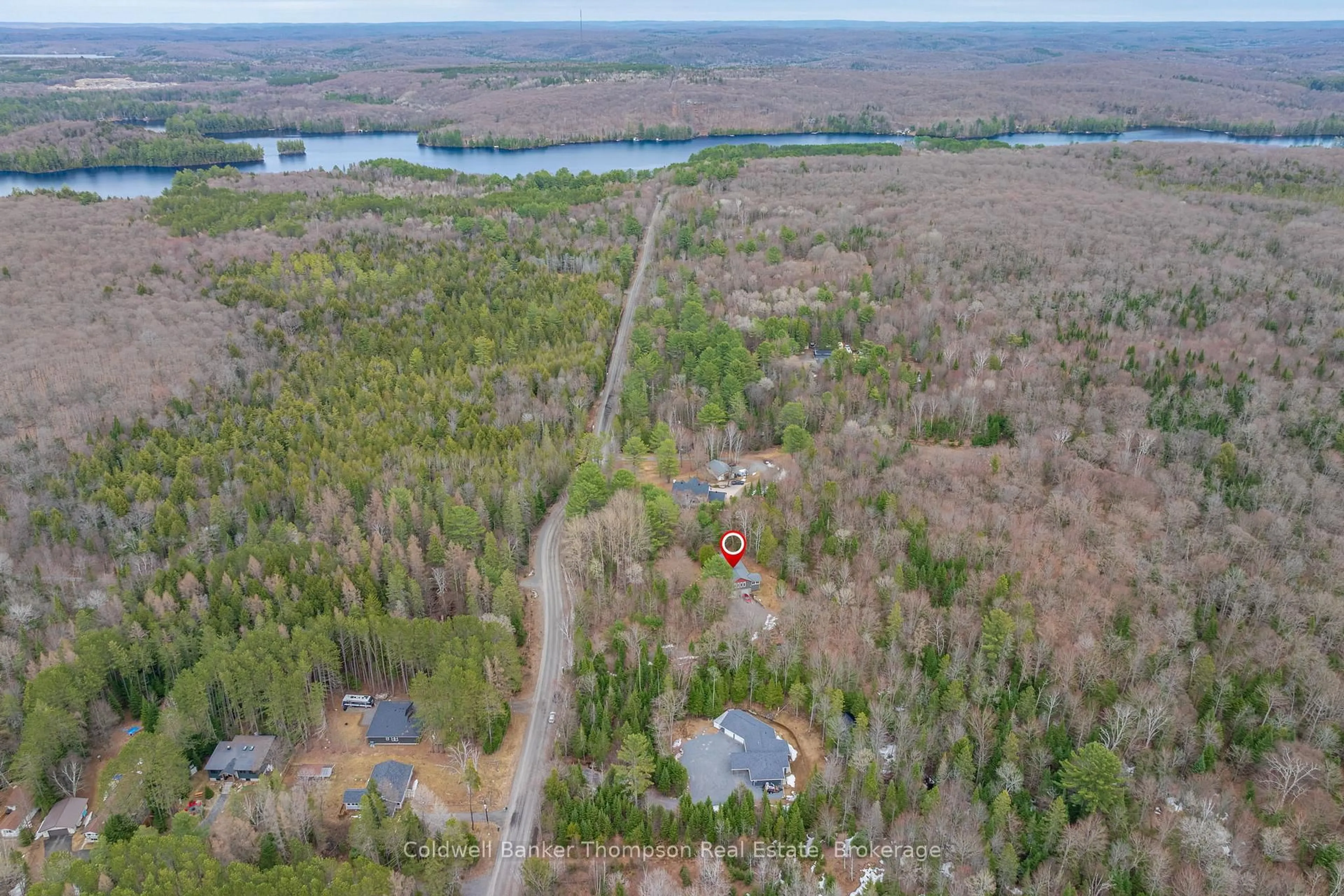 A pic from outside/outdoor area/front of a property/back of a property/a pic from drone, water/lake/river/ocean view for 1039 South Waseosa Lake Rd, Huntsville Ontario P1H 2N5