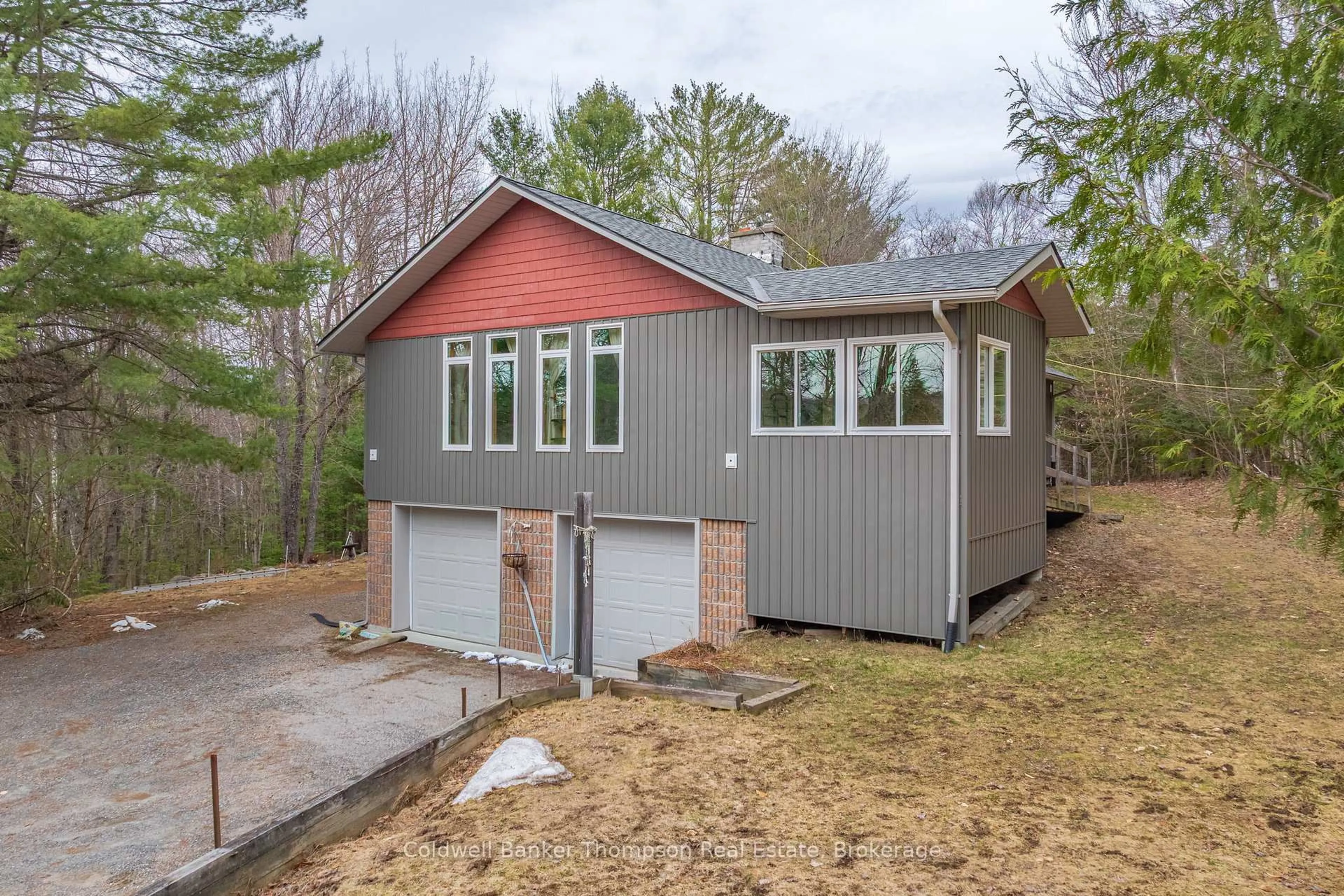 Home with vinyl exterior material, street for 1039 South Waseosa Lake Rd, Huntsville Ontario P1H 2N5