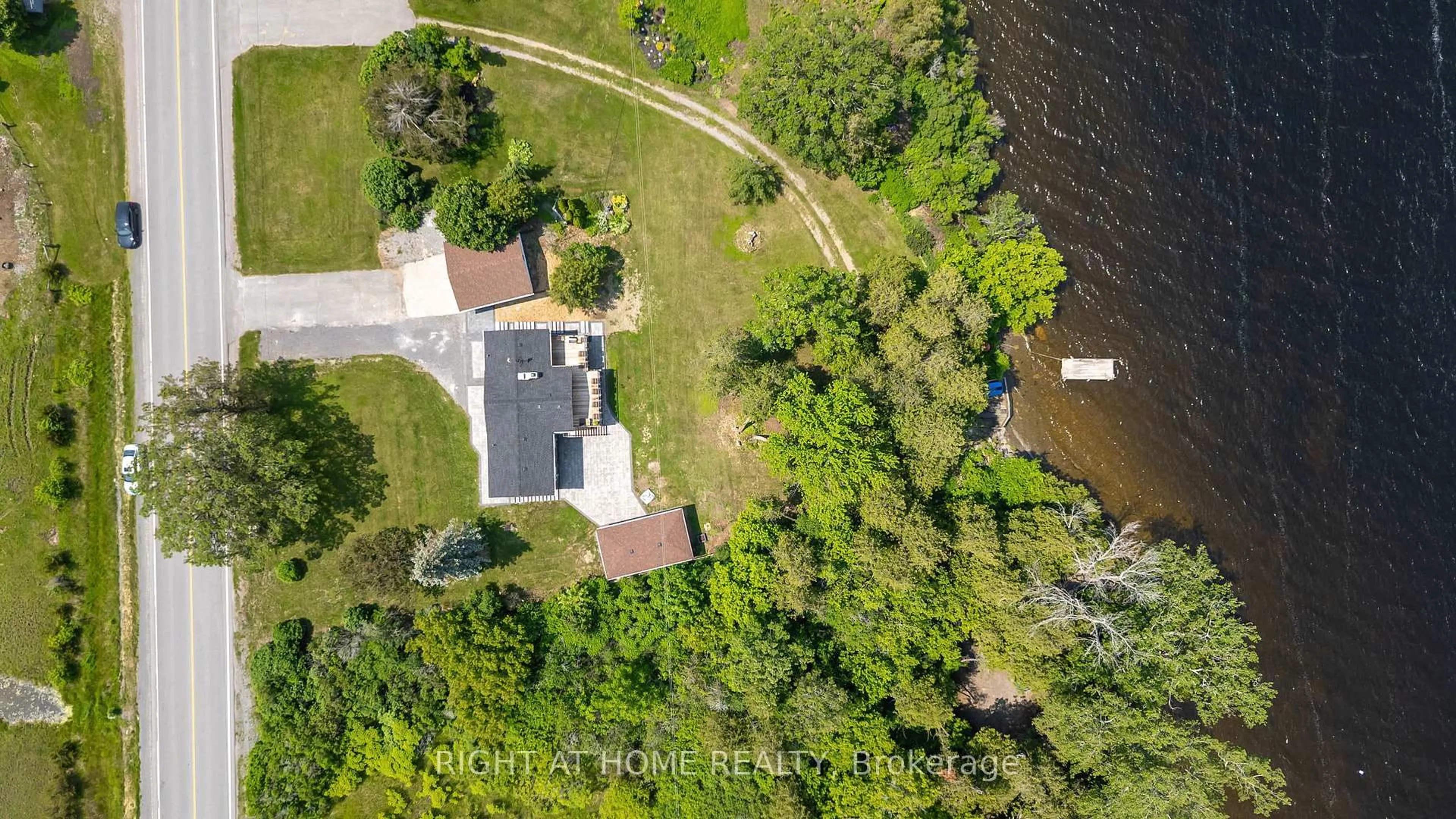 A pic from outside/outdoor area/front of a property/back of a property/a pic from drone, water/lake/river/ocean view for 4670 COUNTY ROAD 1 Rd, Prince Edward County Ontario K0K 1T0