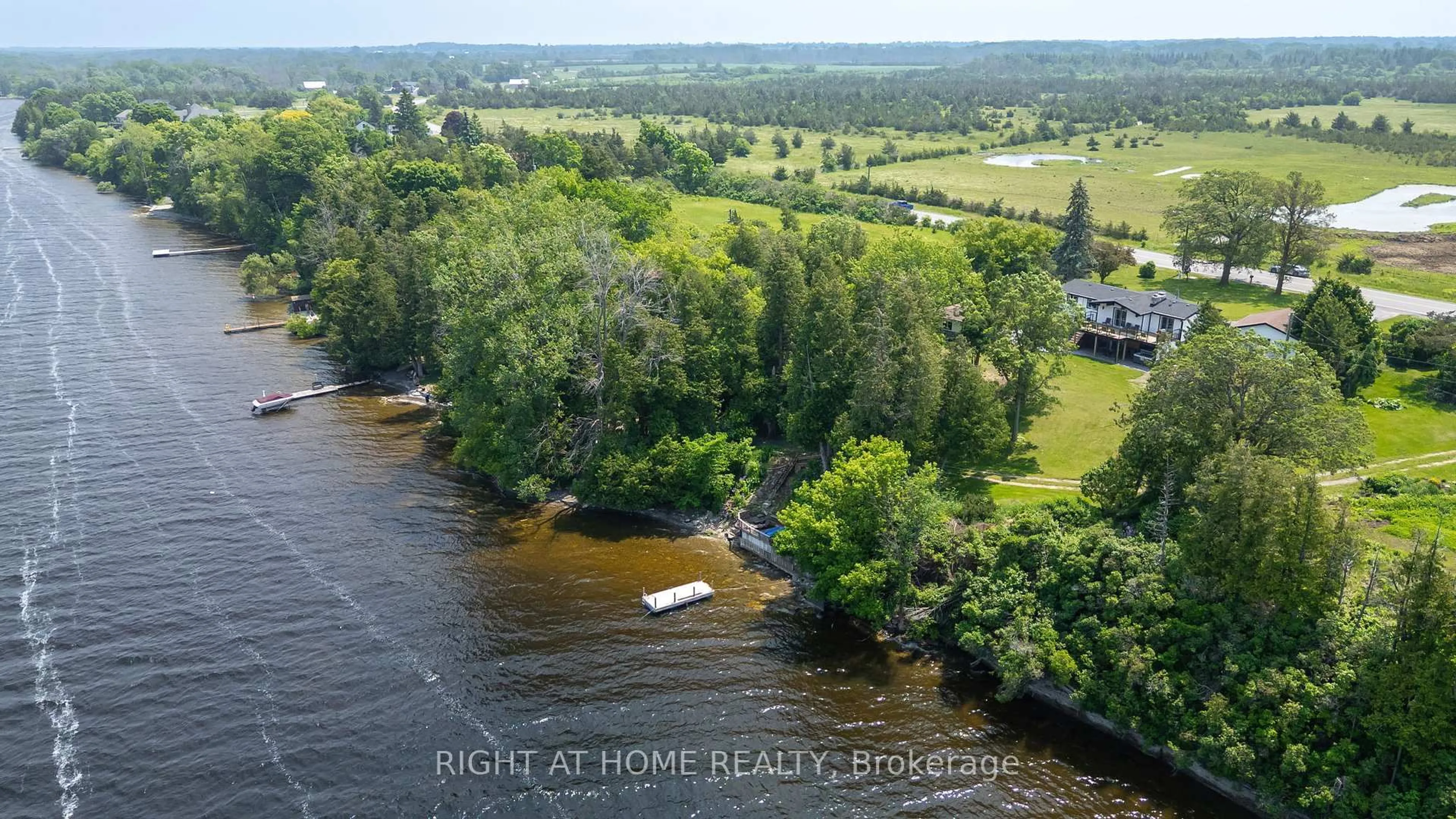 A pic from outside/outdoor area/front of a property/back of a property/a pic from drone, water/lake/river/ocean view for 4670 COUNTY ROAD 1 Rd, Prince Edward County Ontario K0K 1T0