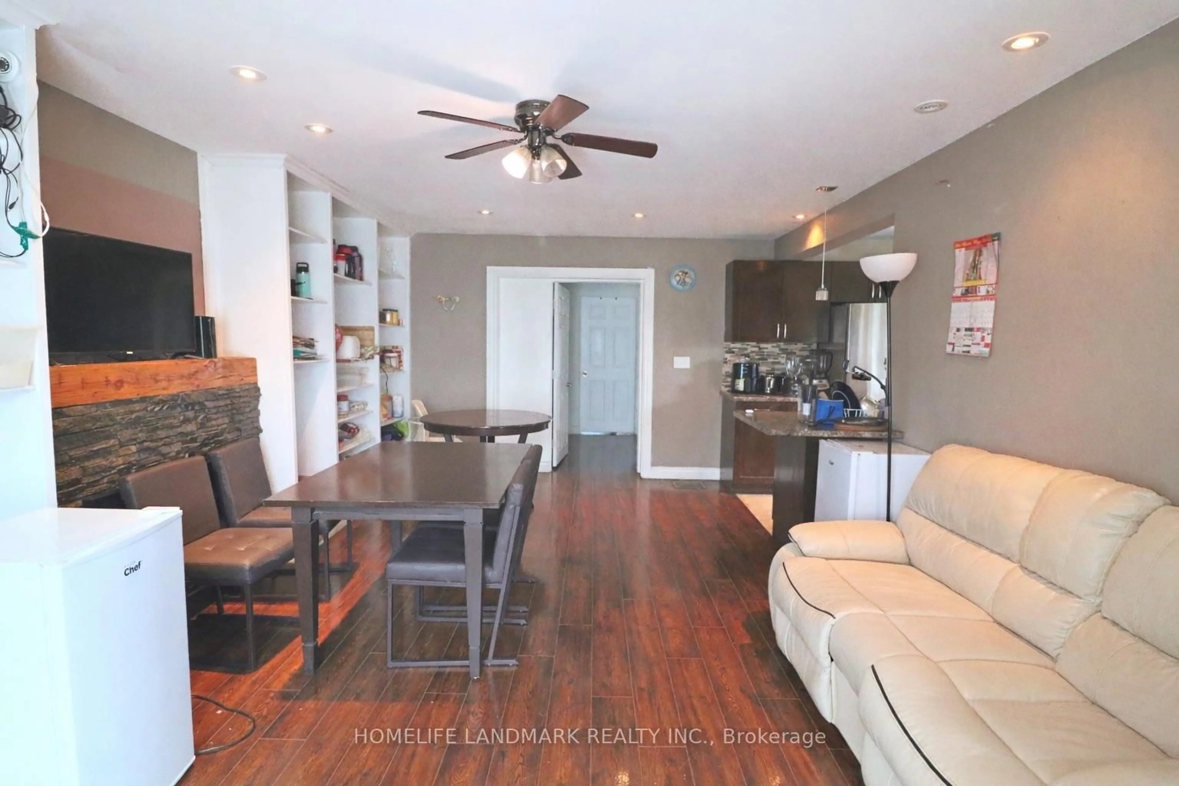 Open concept kitchen, wood/laminate floor for 4664 Homewood Ave, Niagara Falls Ontario L2E 4Y2