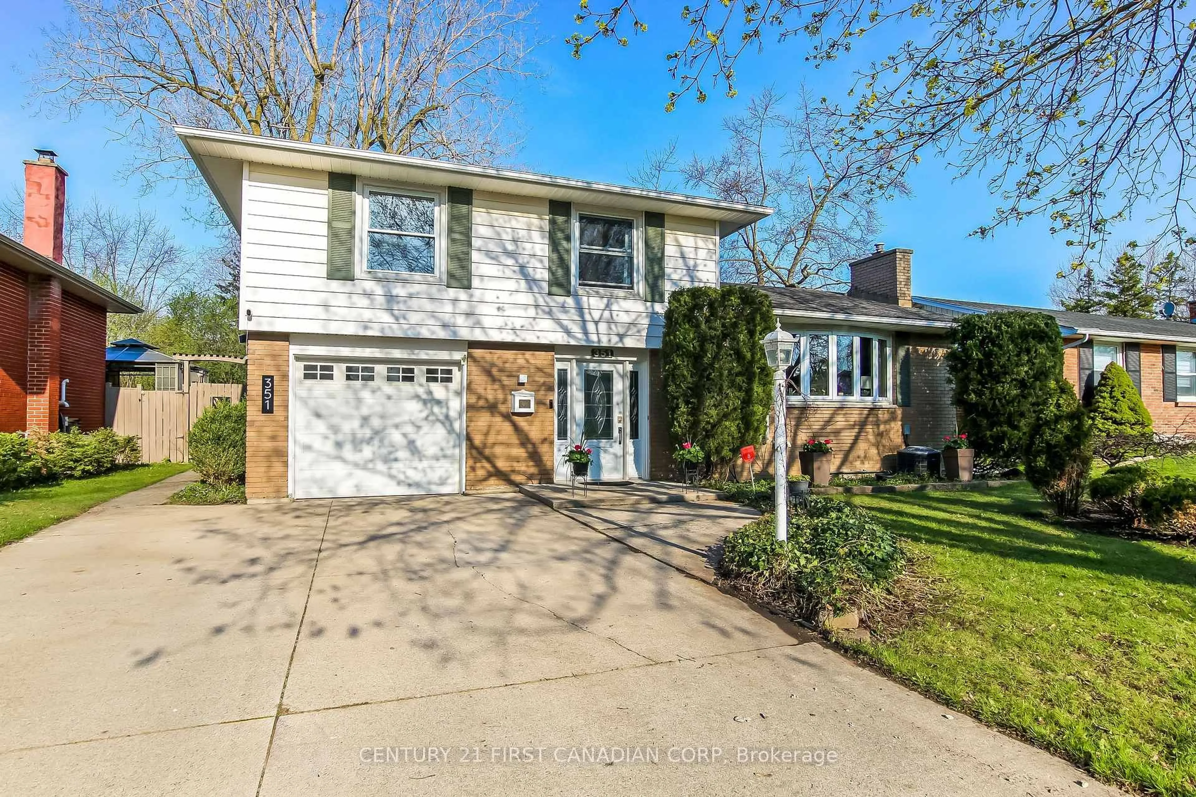 Home with vinyl exterior material, street for 351 Base Line Rd, London South Ontario N6J 1W5