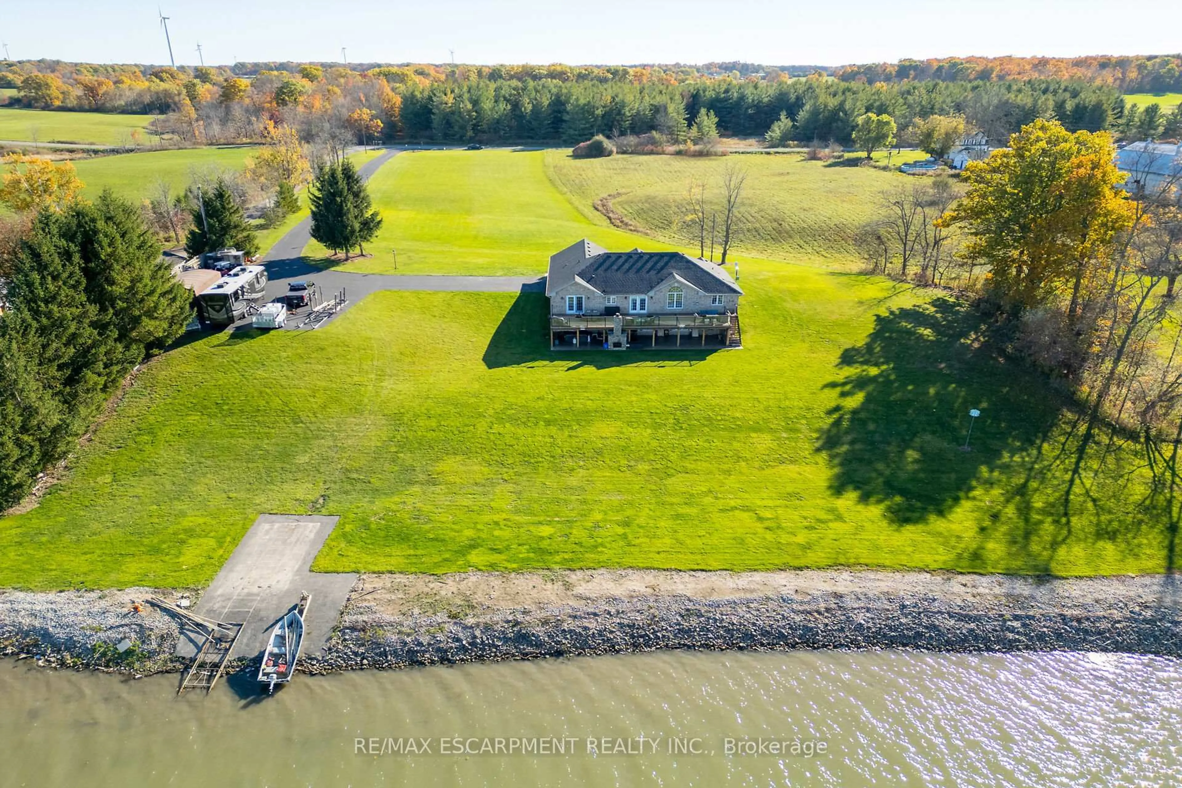A pic from outside/outdoor area/front of a property/back of a property/a pic from drone, water/lake/river/ocean view for 1140 River Rd, Haldimand Ontario N0A 1E0