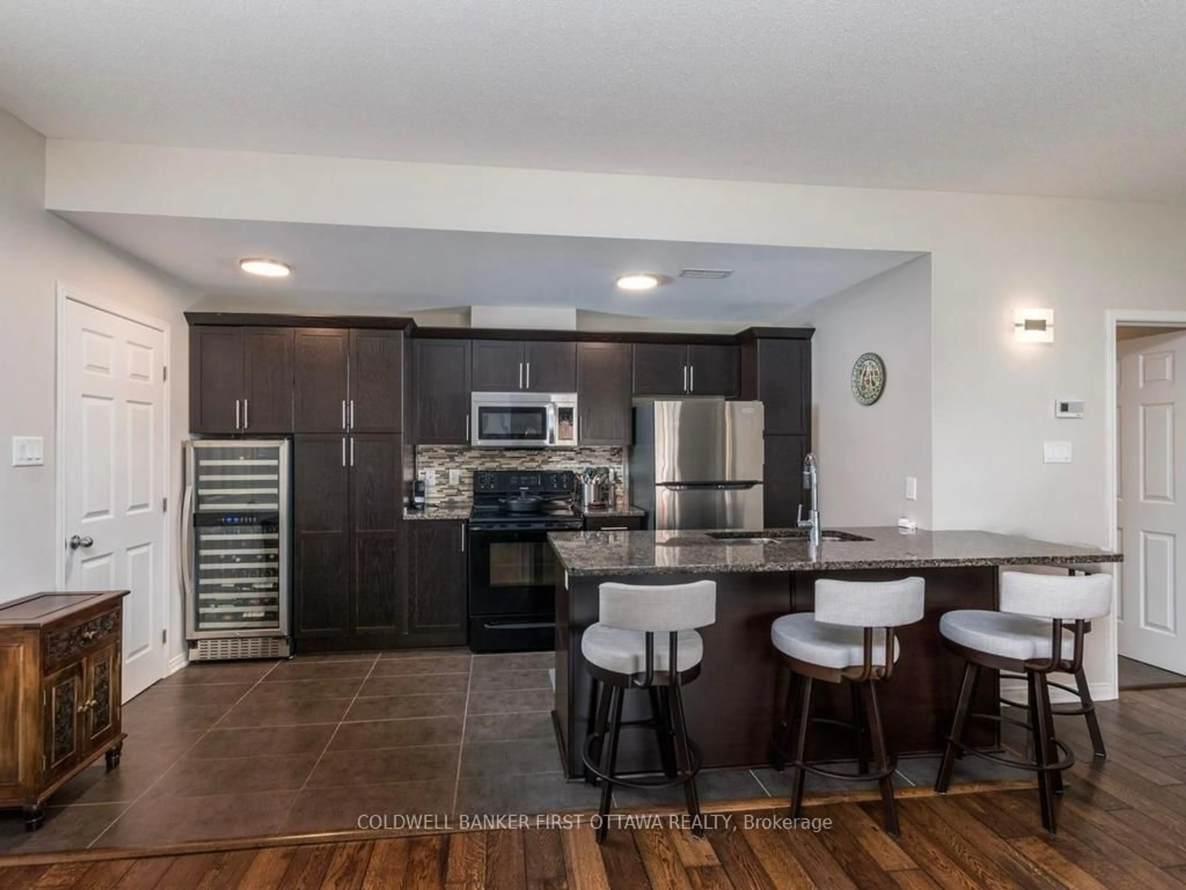 Open concept kitchen, ceramic/tile floor for 100 Artesa Private #E, Ottawa Ontario K2S 0J8