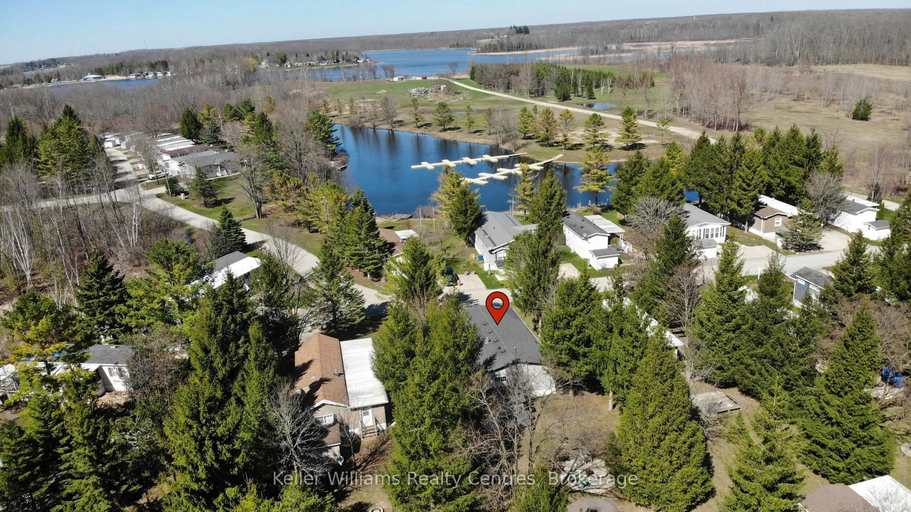 A pic from outside/outdoor area/front of a property/back of a property/a pic from drone, water/lake/river/ocean view for 13 Southline Ave #PR11, Huron-Kinloss Ontario N2Z 2X5