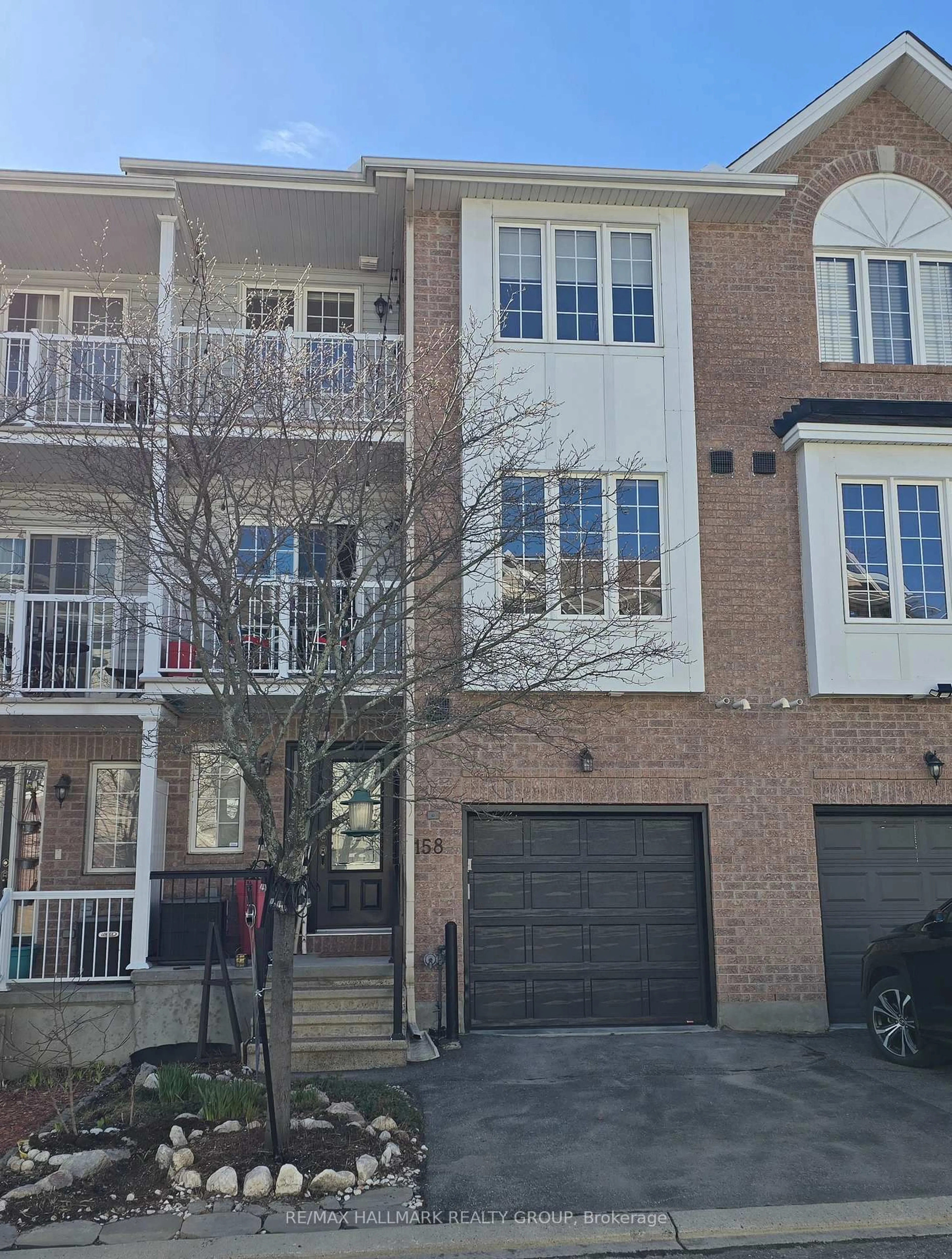 Home with brick exterior material, street for 158 Fordham Private, Ottawa Ontario K2C 4G5