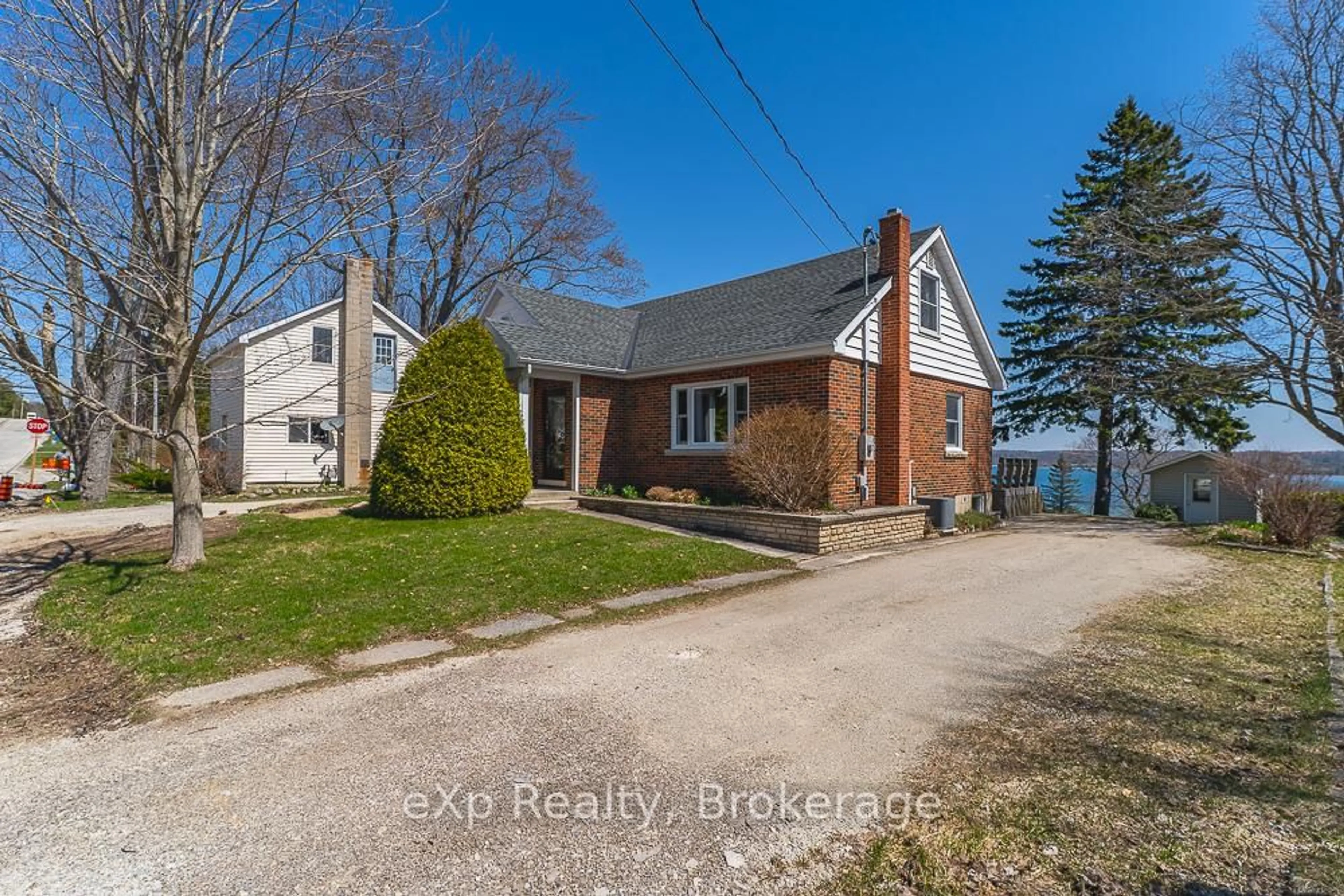 A pic from outside/outdoor area/front of a property/back of a property/a pic from drone, water/lake/river/ocean view for 673 Gould St, South Bruce Peninsula Ontario N0H 2T0