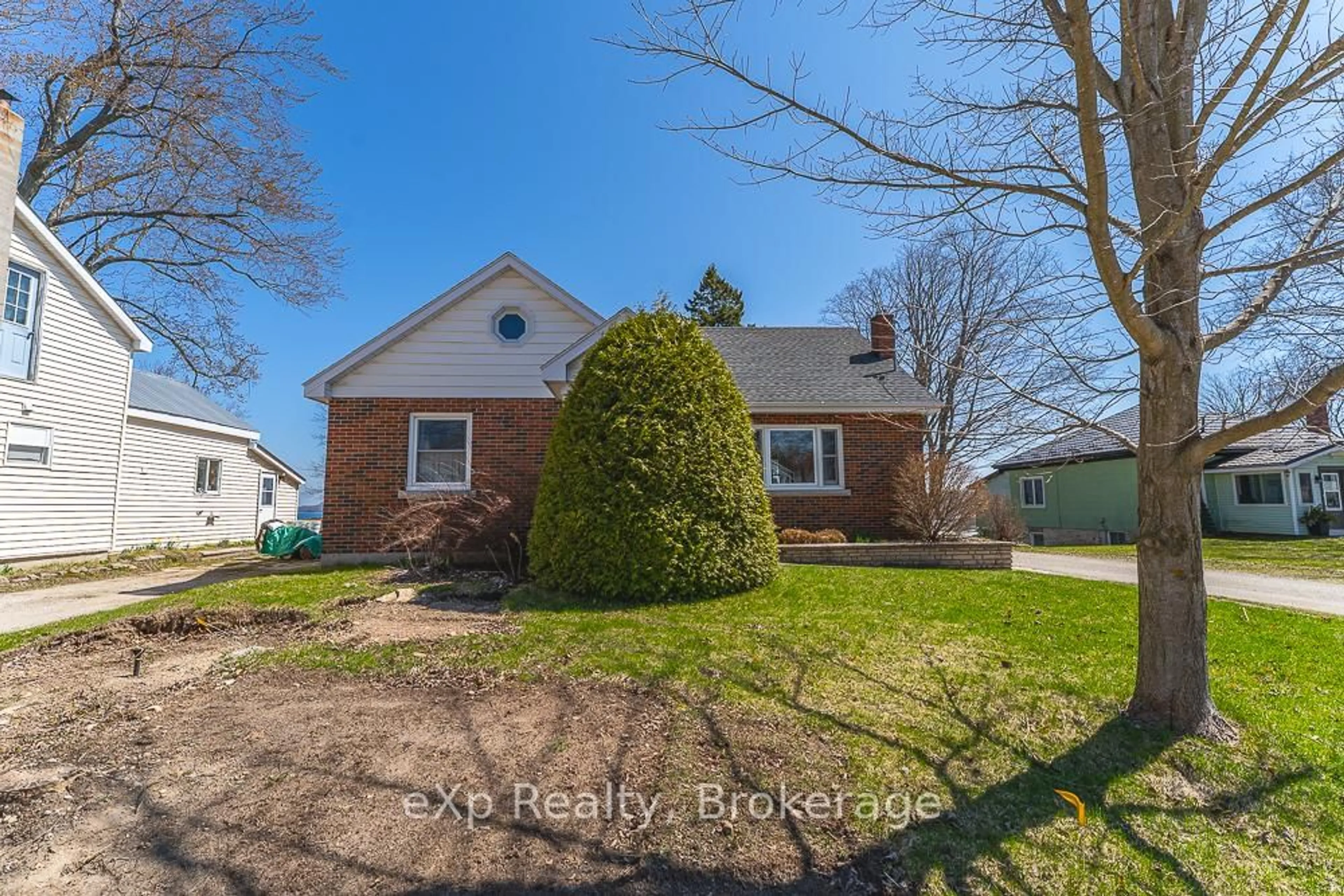 A pic from outside/outdoor area/front of a property/back of a property/a pic from drone, street for 673 Gould St, South Bruce Peninsula Ontario N0H 2T0