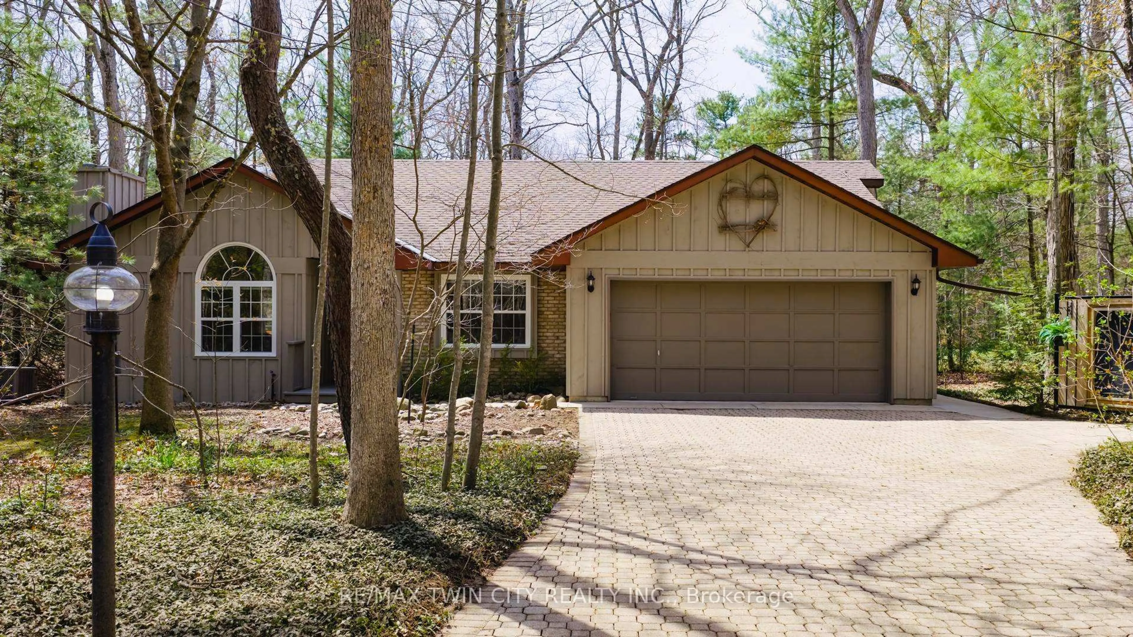 Home with brick exterior material, street for 10325 Grand Oaks Dr, Lambton Shores Ontario N0M 1T0