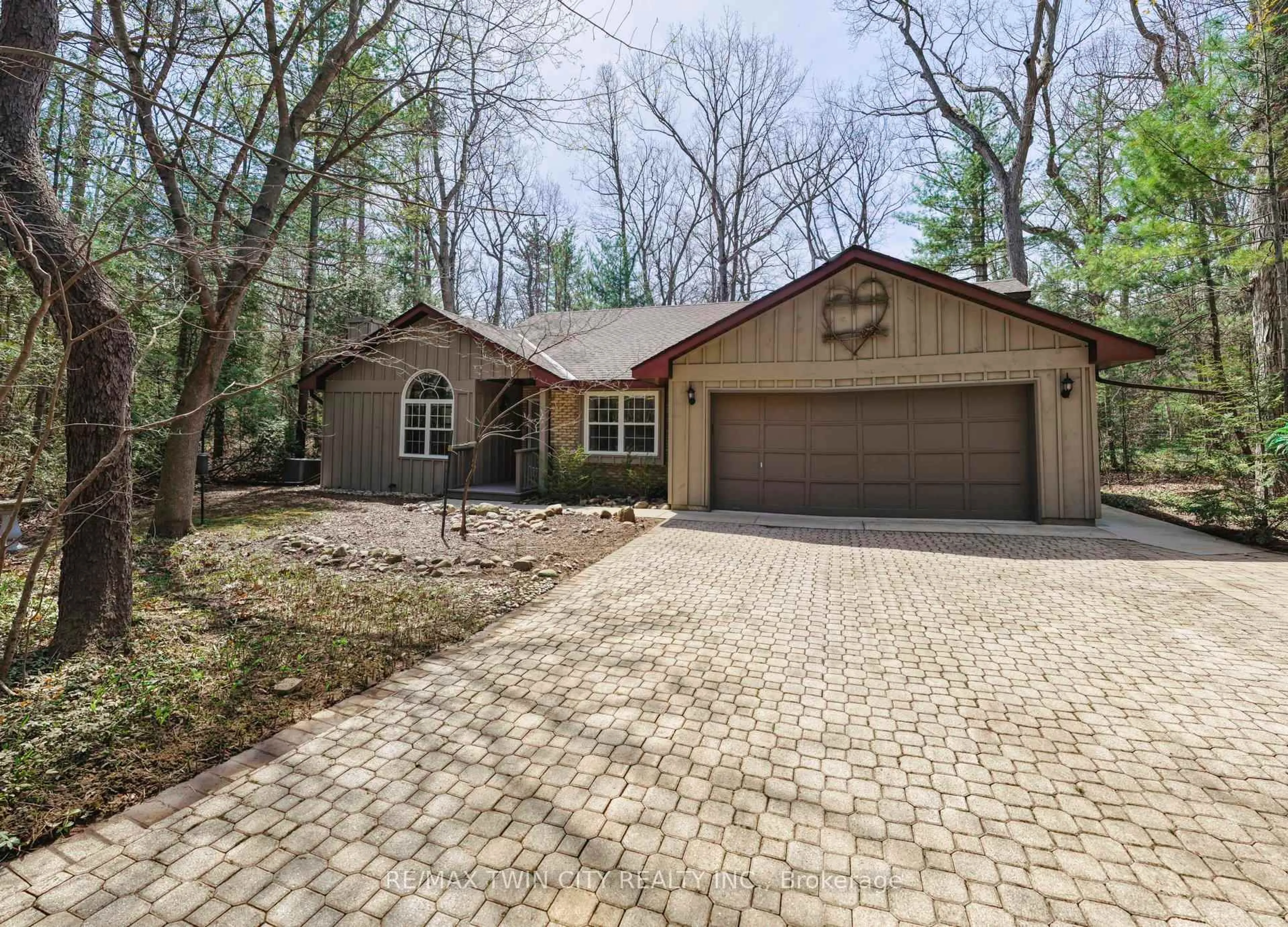 Home with brick exterior material, street for 10325 Grand Oaks Dr, Lambton Shores Ontario N0M 1T0