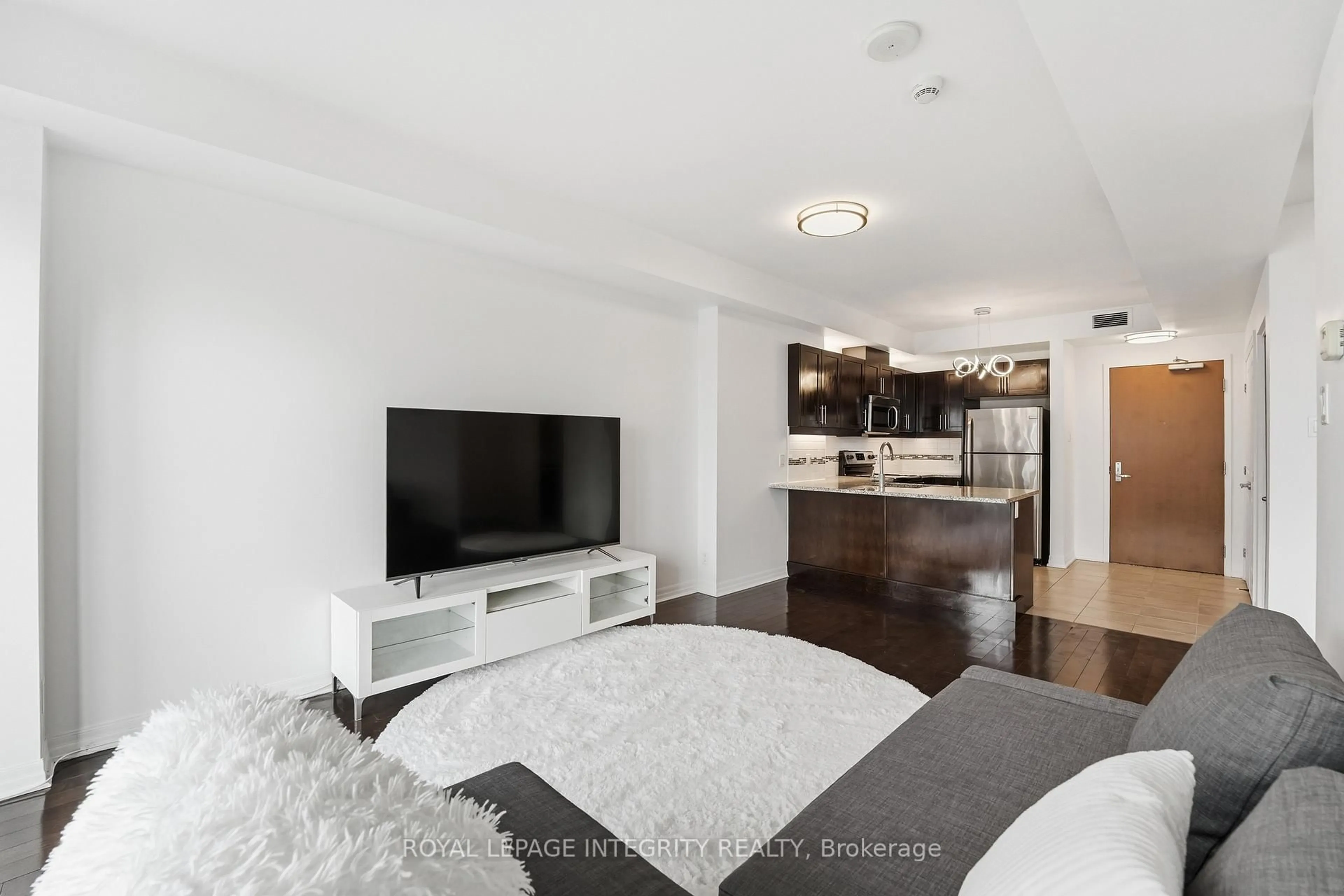 Living room with furniture, unknown for 242 Rideau St #2403, Ottawa Ontario K1N 0B7