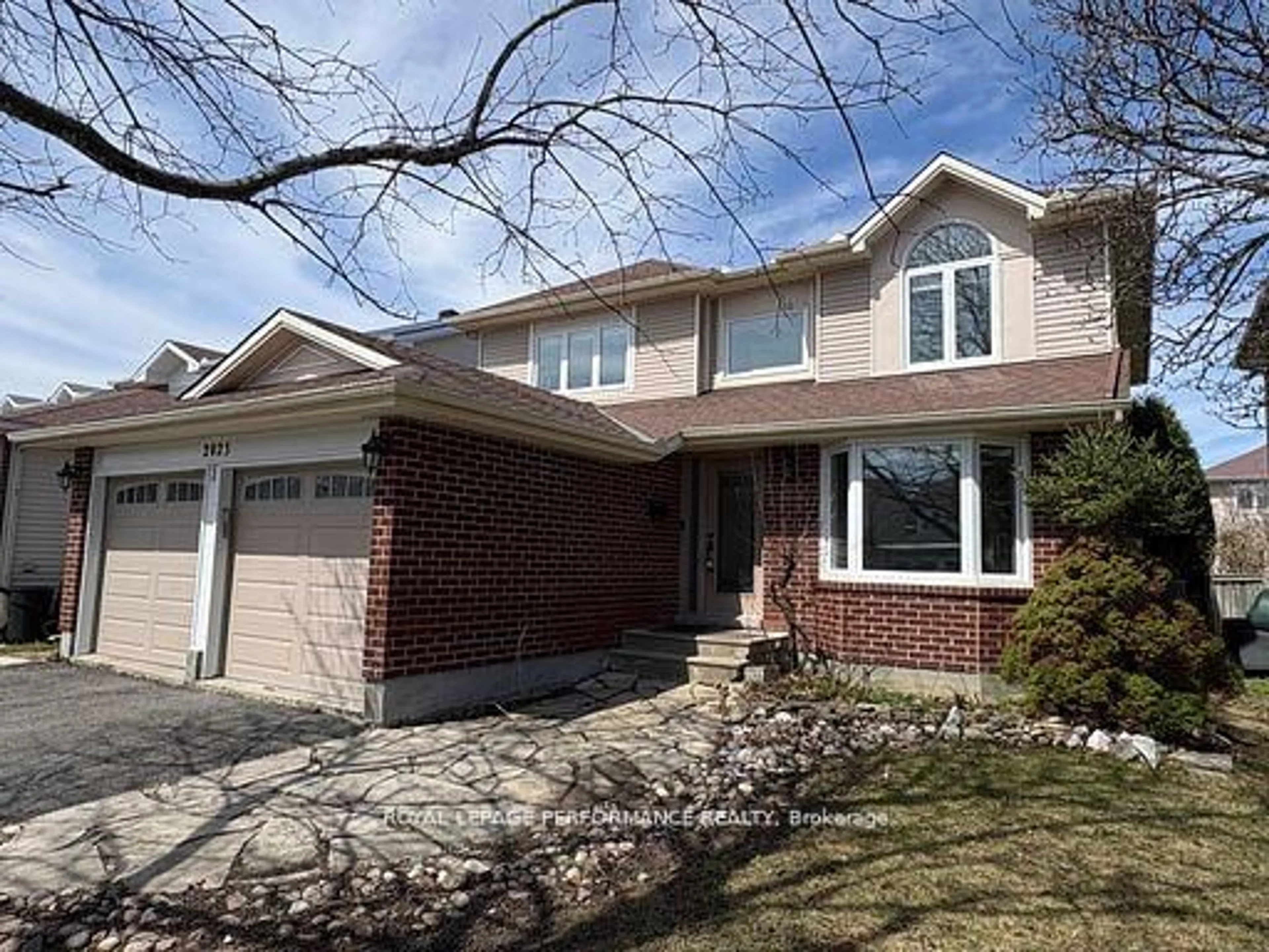 Home with brick exterior material, street for 2023 Rolling Brook Dr, Ottawa Ontario K1W 1C9