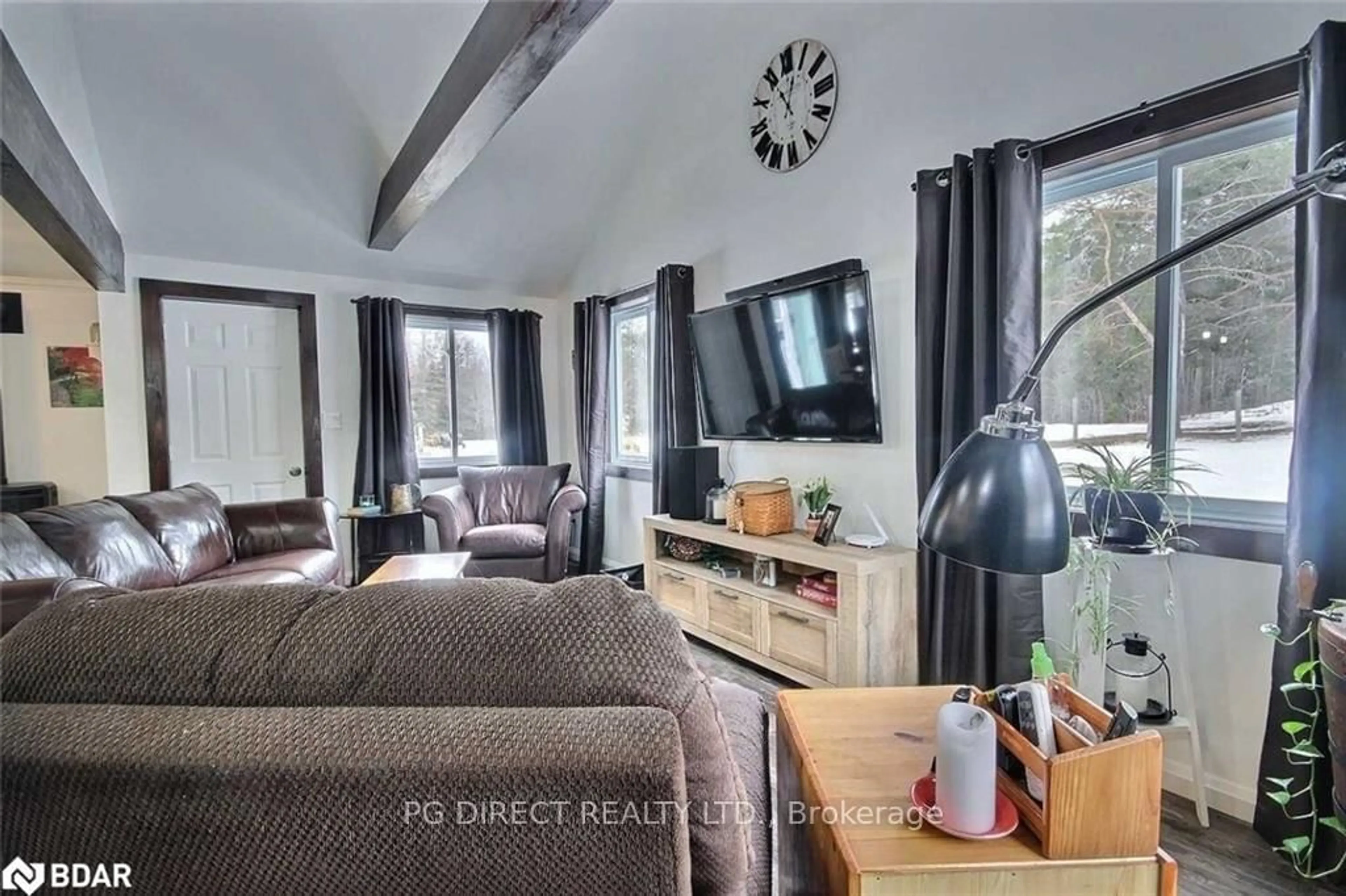 Living room with furniture, unknown for 667 Yearley Rd, McMurrich/Monteith Ontario P0A 1Y0