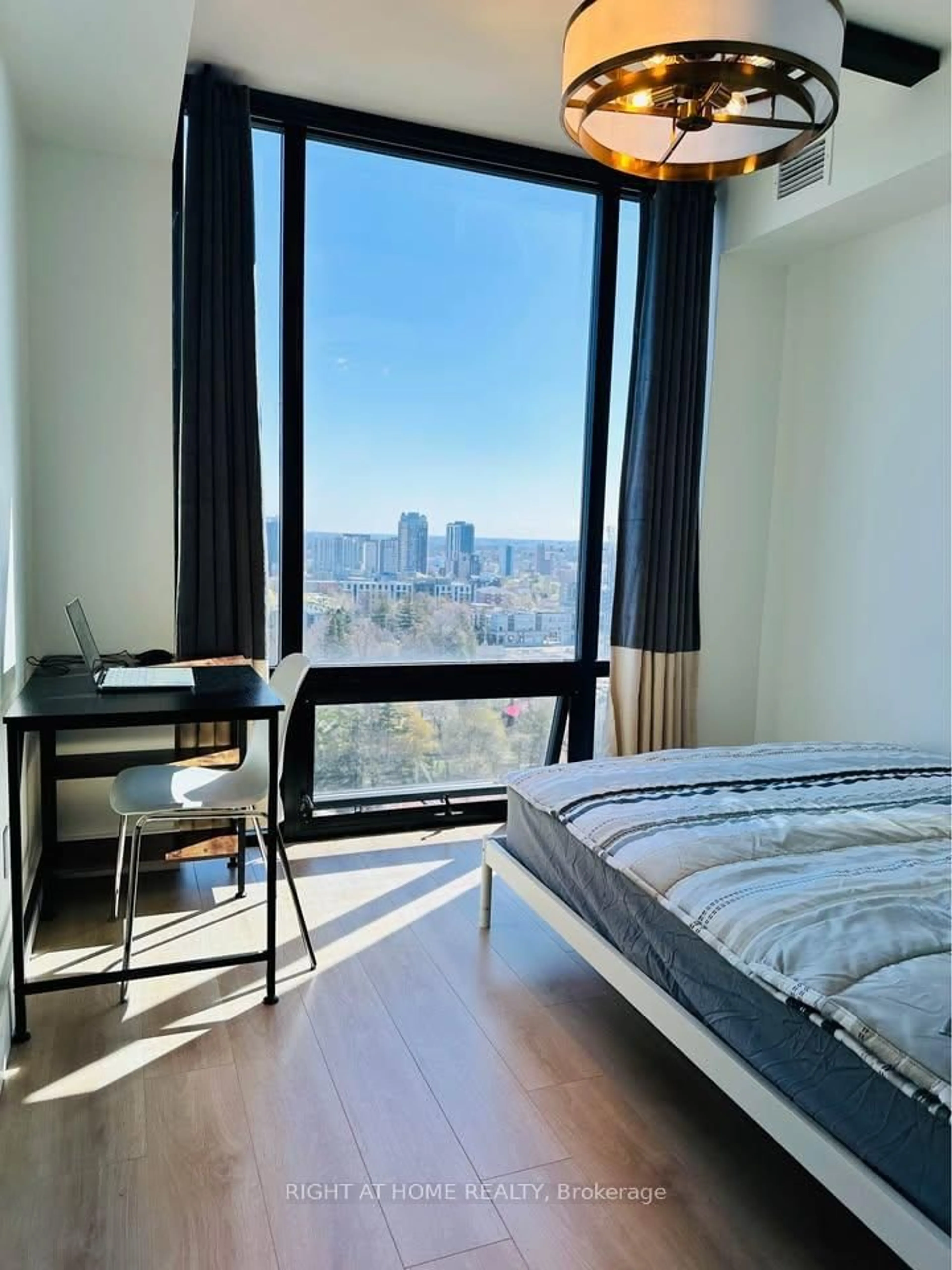 Bedroom with bed, wood/laminate floor for 145 Columbia St #24, Waterloo Ontario N2L 0K7