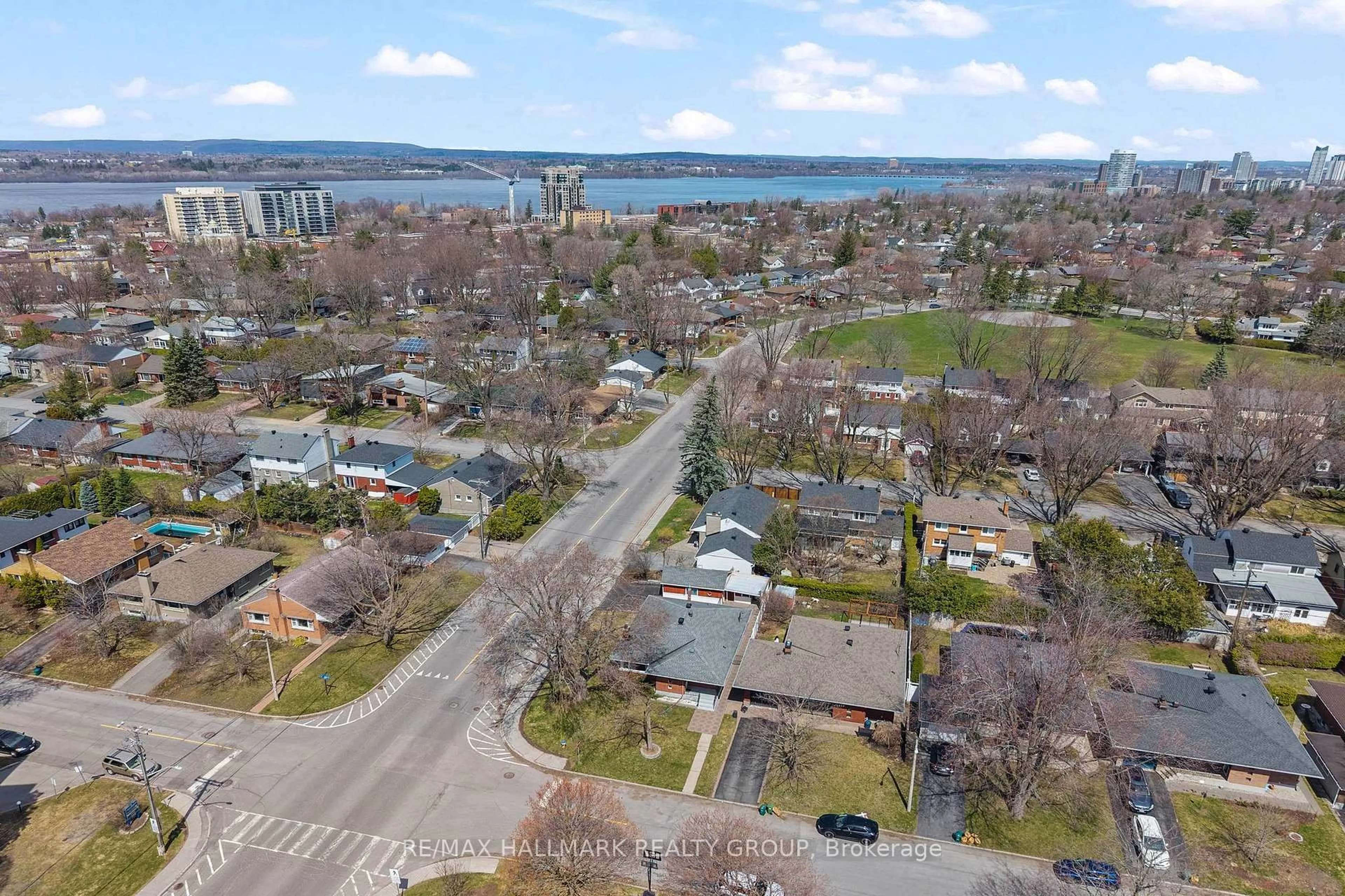 A pic from outside/outdoor area/front of a property/back of a property/a pic from drone, water/lake/river/ocean view for 2075 Neepawa Ave, Ottawa Ontario K2A 3L7