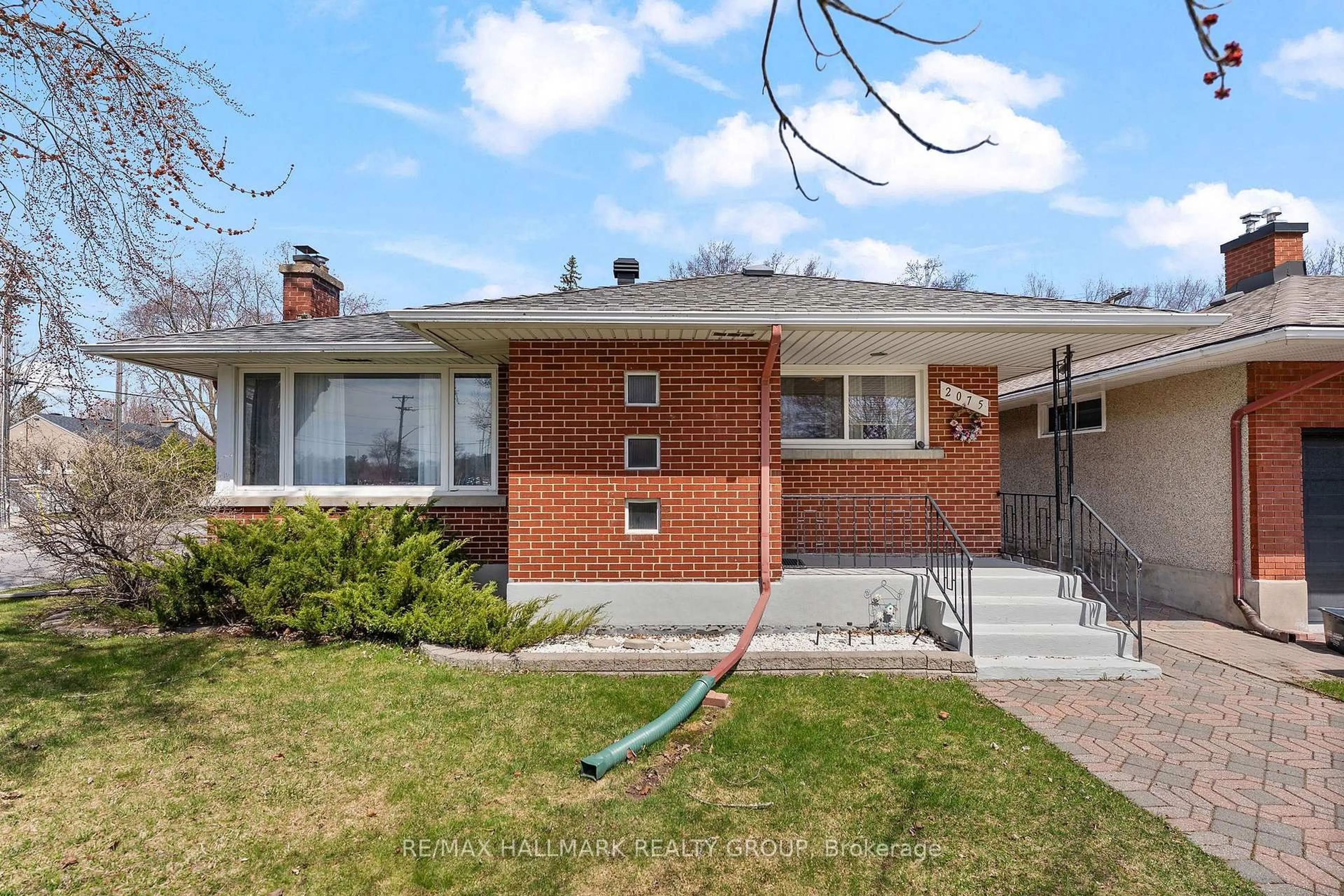 Home with brick exterior material, street for 2075 Neepawa Ave, Ottawa Ontario K2A 3L7