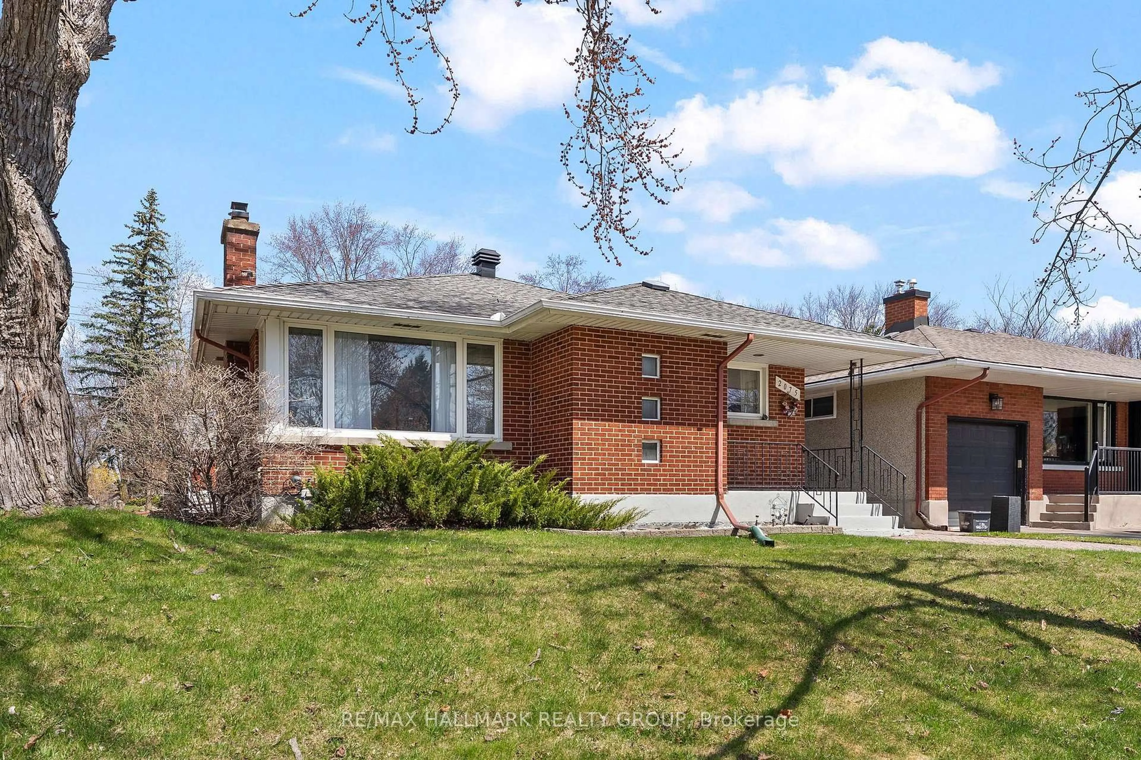 Home with brick exterior material, street for 2075 Neepawa Ave, Ottawa Ontario K2A 3L7