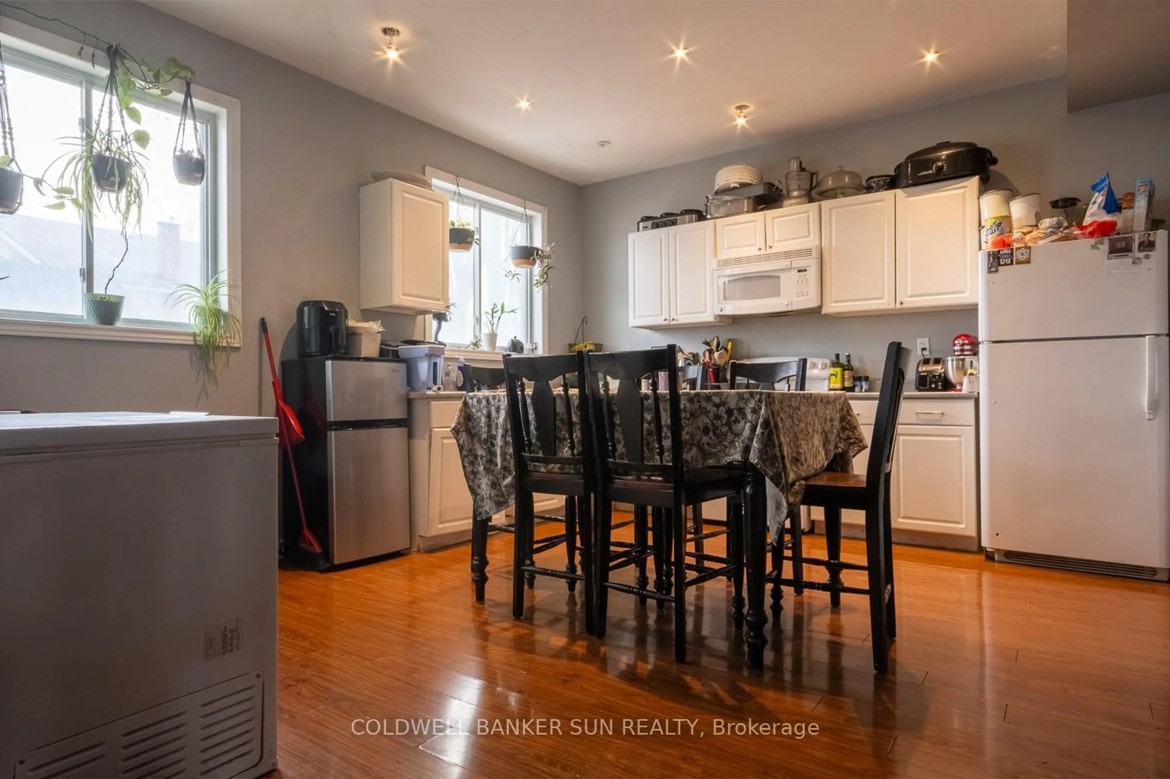 Open concept kitchen, wood/laminate floor for 63 Lorne Ave, Quinte West Ontario K8V 5B6