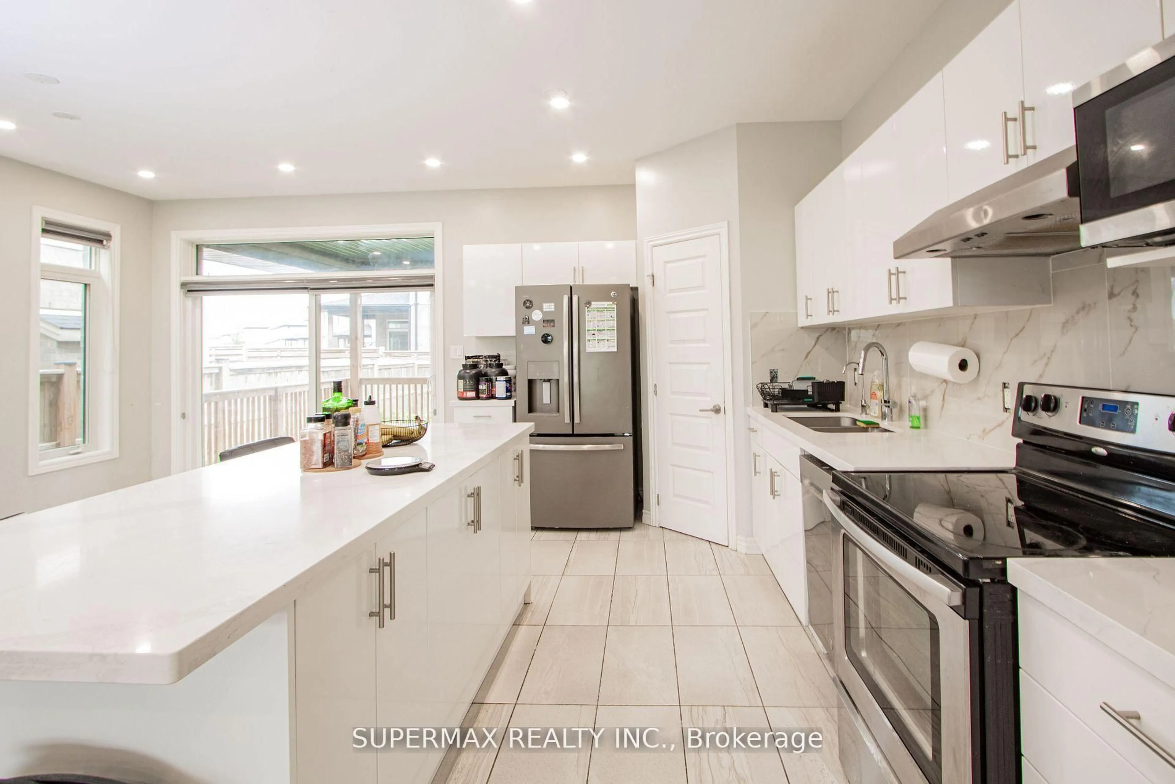 Open concept kitchen, ceramic/tile floor for 3019 Tokala Tr, London North Ontario N6G 0S8