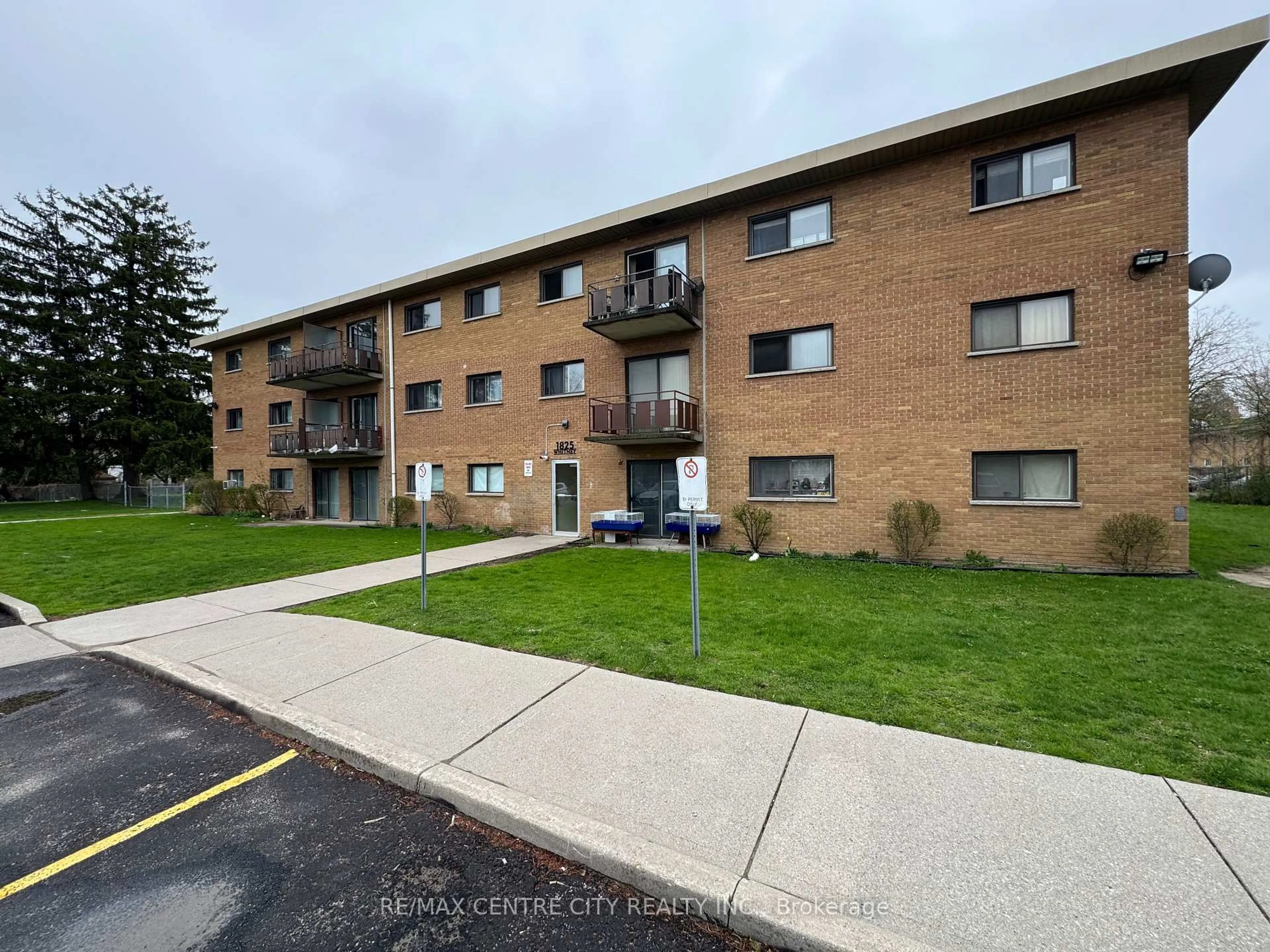 A pic from outside/outdoor area/front of a property/back of a property/a pic from drone, street for 1825 Whitney St #307, London East Ontario N5W 2W3