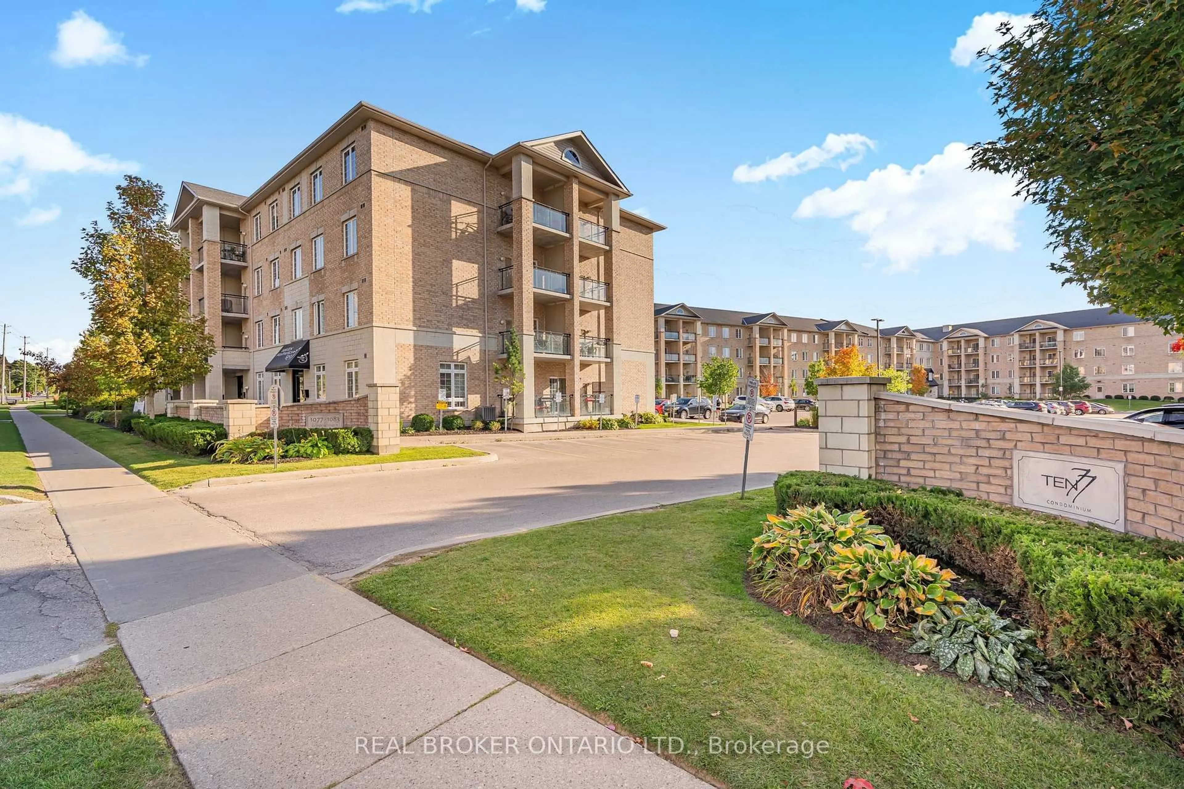 A pic from outside/outdoor area/front of a property/back of a property/a pic from drone, unknown for 1083 Gordon St #403, Guelph Ontario N1G 0E8