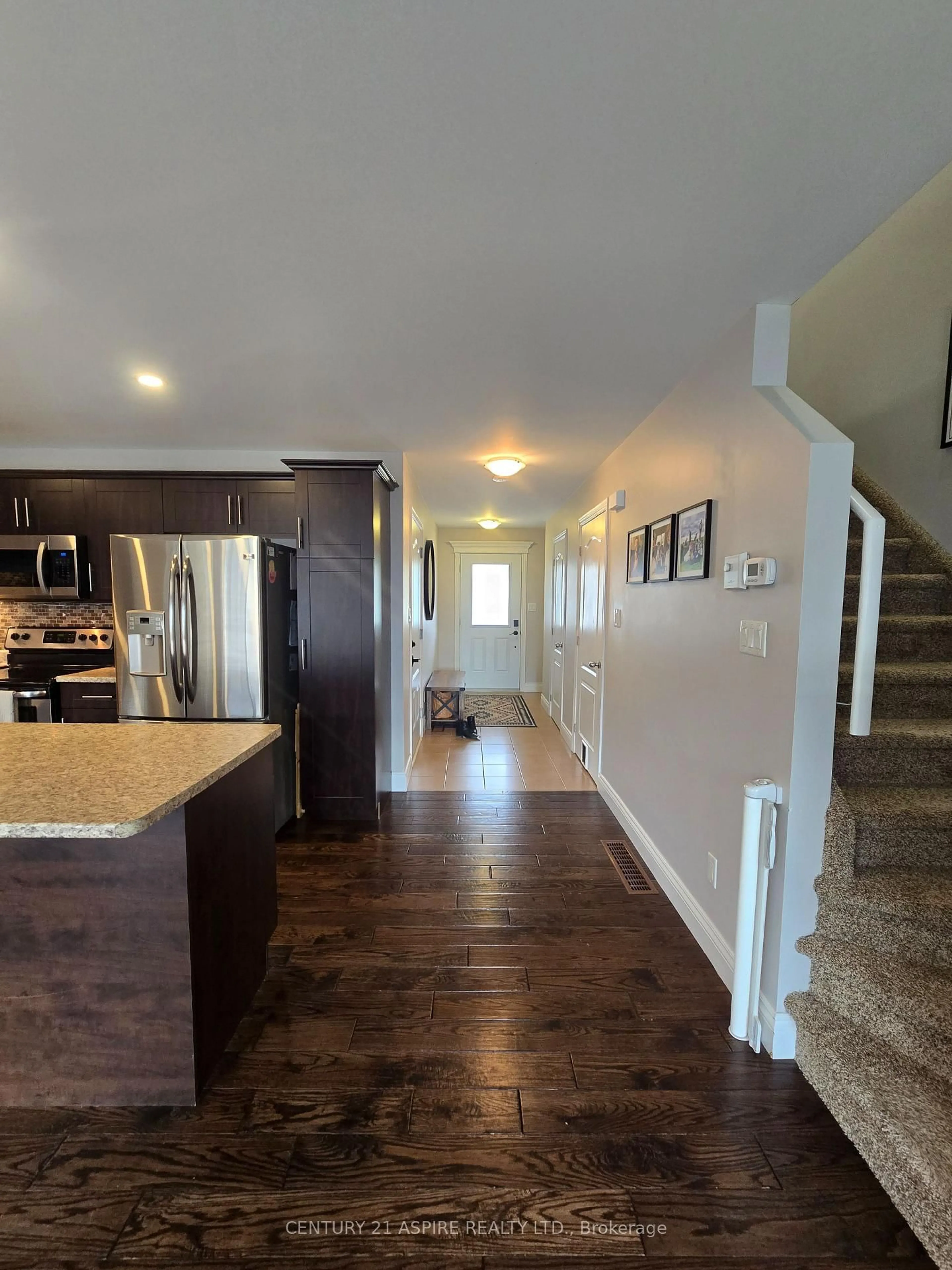 Open concept kitchen, wood/laminate floor for 44 Winston Ave, Petawawa Ontario K8H 0C1