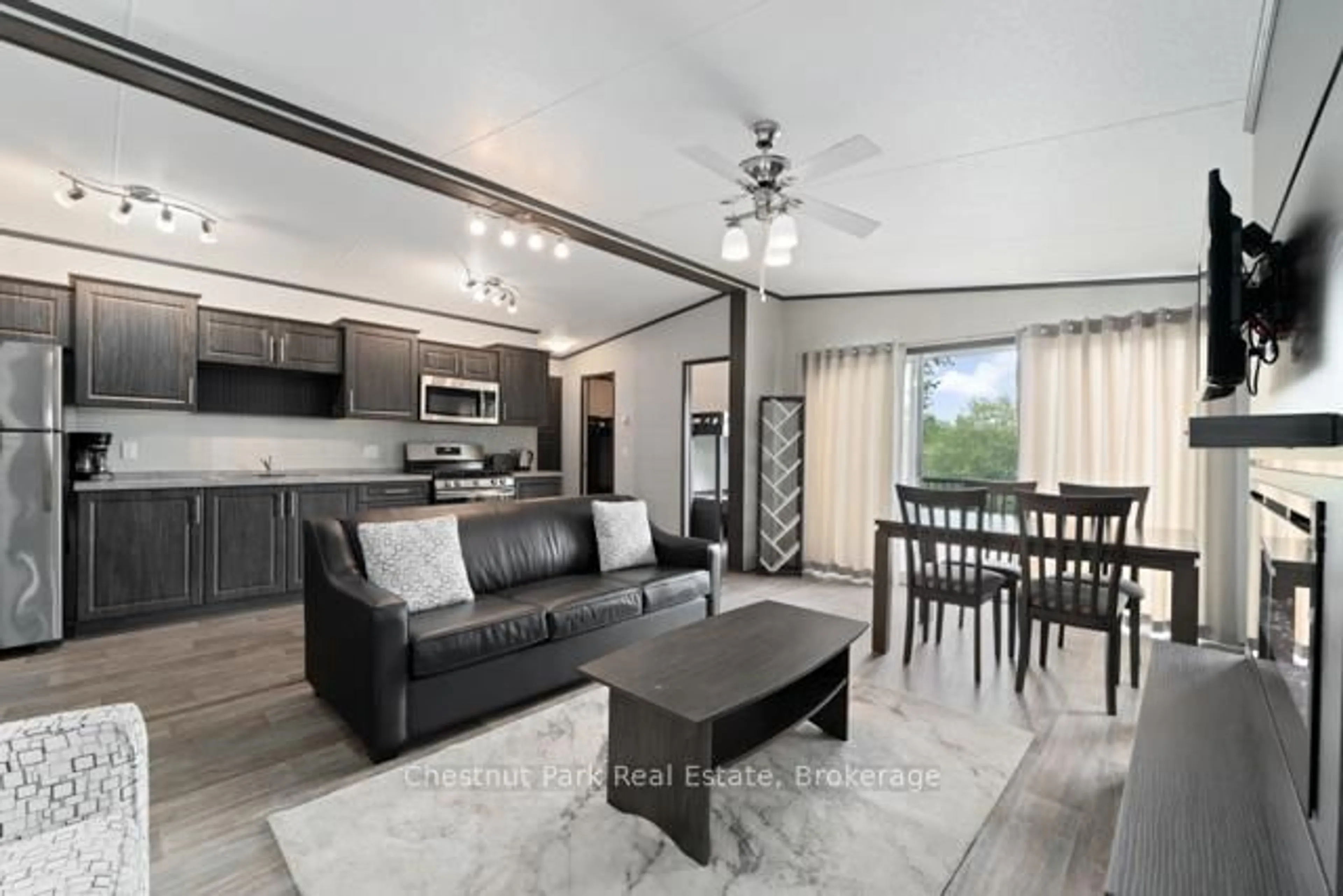 Living room with furniture, unknown for 1047 Bonnie Lake Camp Rd #701, Bracebridge Ontario P1L 1W9