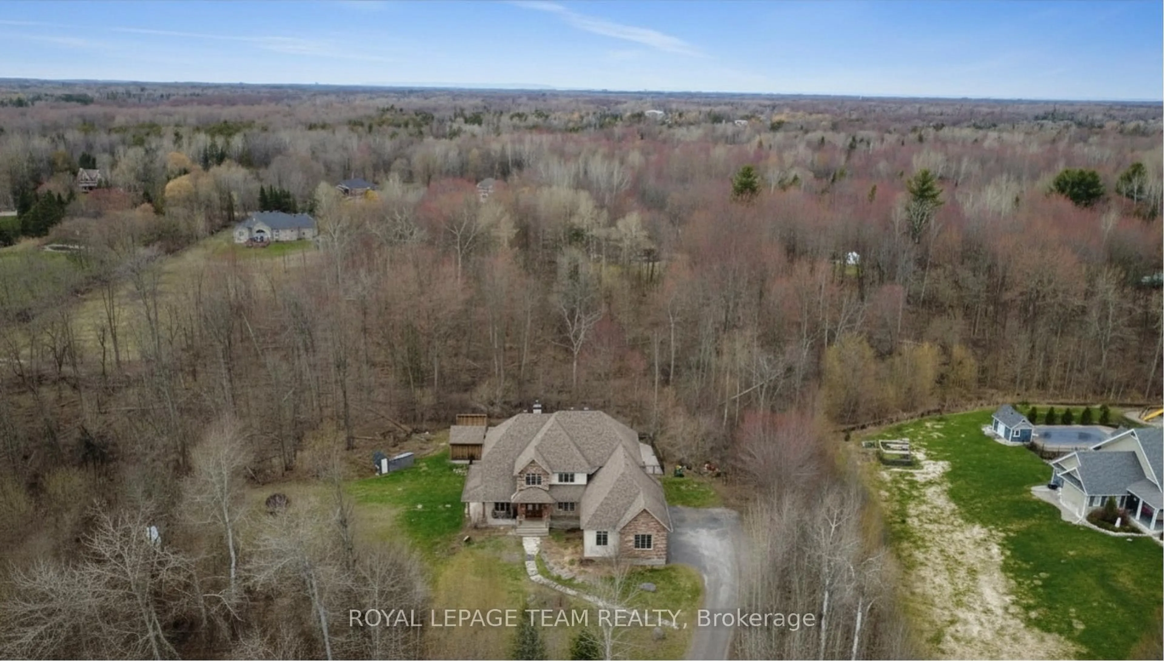 A pic from outside/outdoor area/front of a property/back of a property/a pic from drone, water/lake/river/ocean view for 1671 Reindeer Way, Ottawa Ontario K4P 0A2