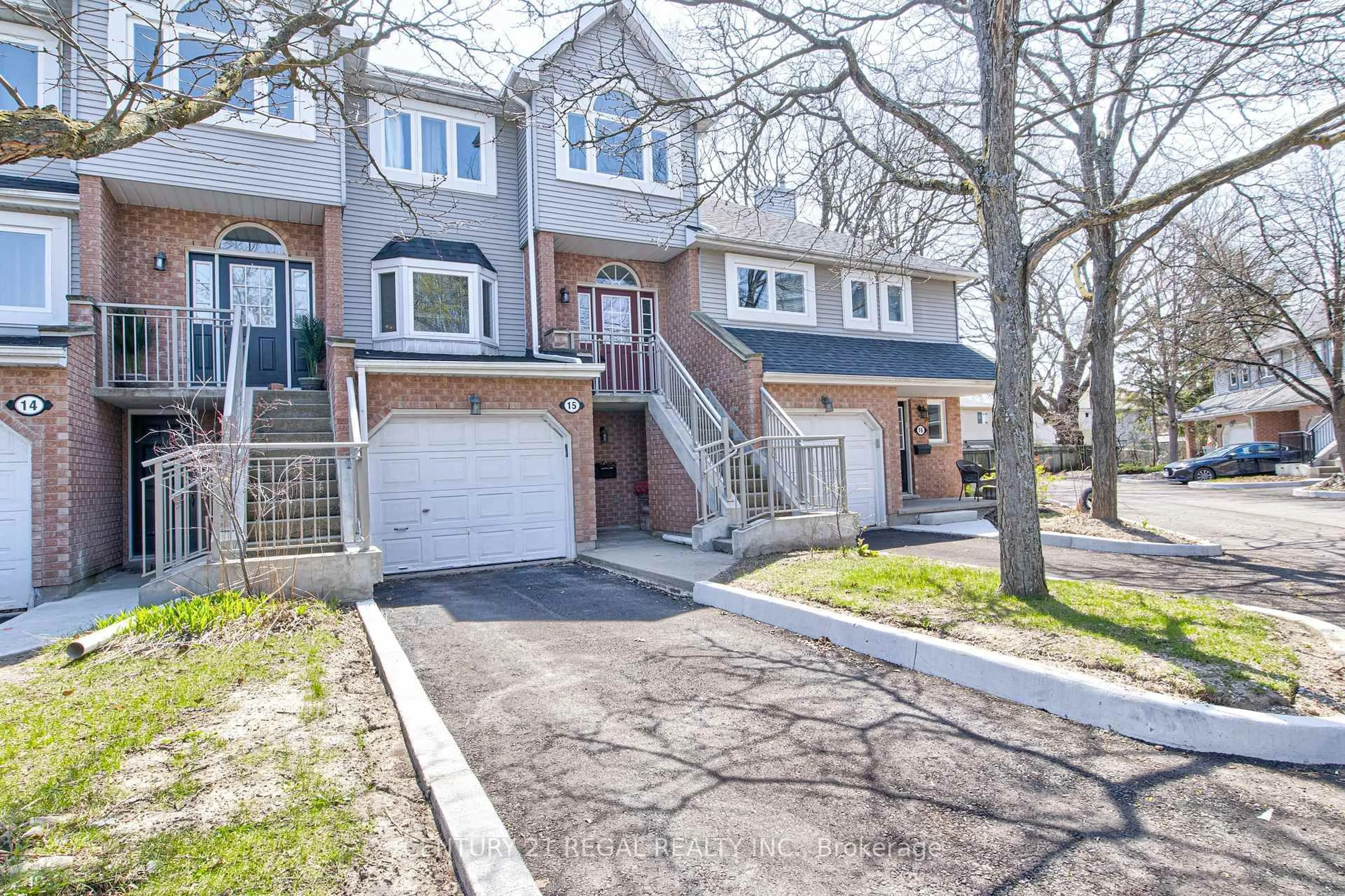 Home with brick exterior material, street for 310 Christopher Dr #15, Cambridge Ontario N1P 1B4