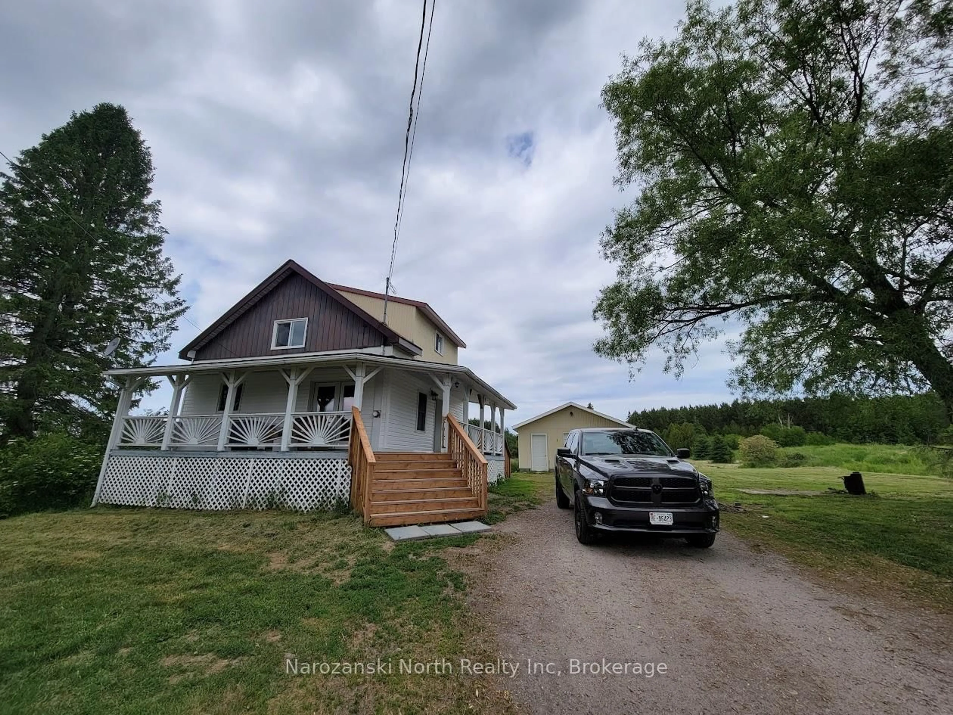 A pic from outside/outdoor area/front of a property/back of a property/a pic from drone, unknown for 809 Highway 64 Highway, French River Ontario P0M 1A0