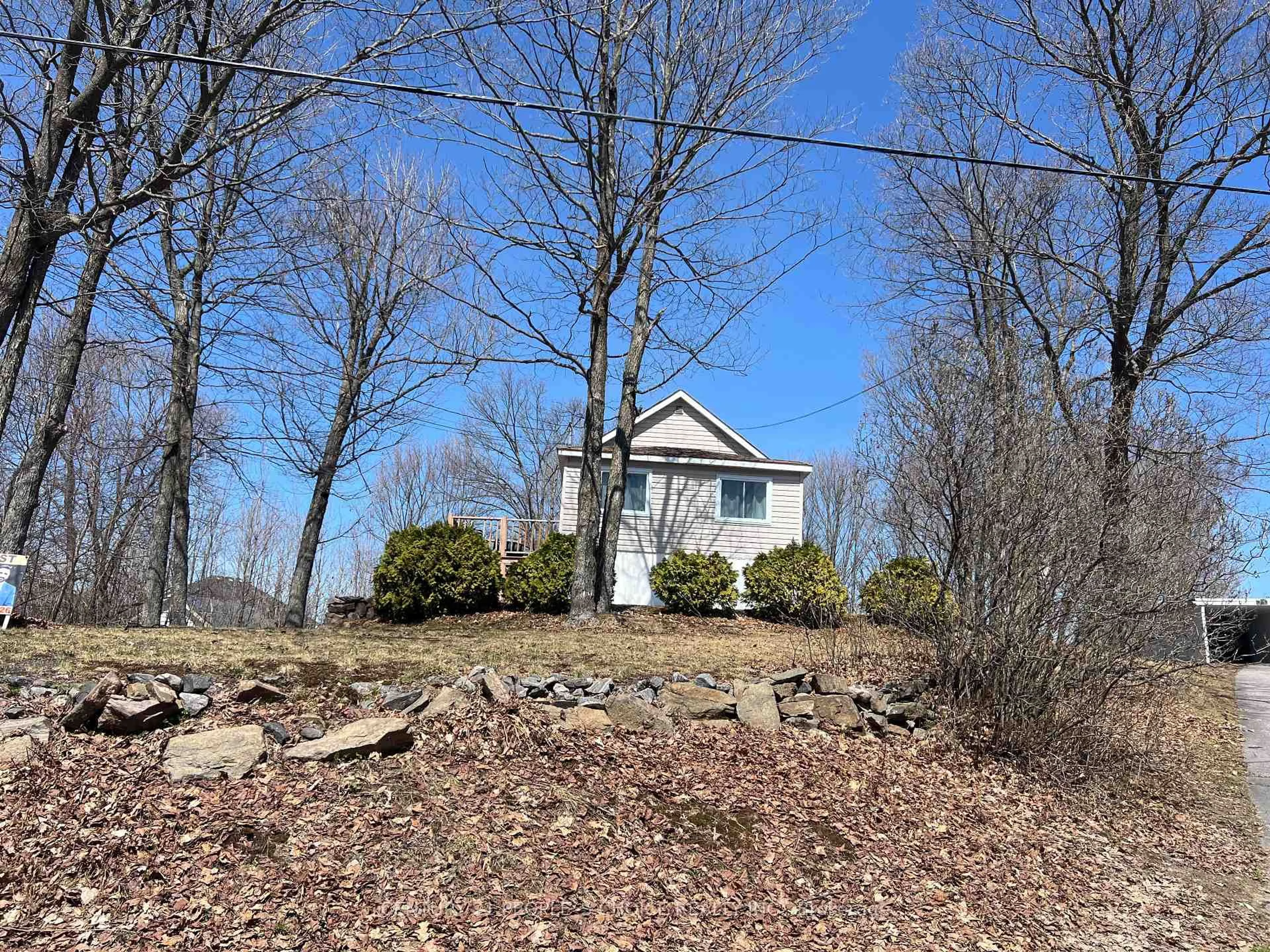 A pic from outside/outdoor area/front of a property/back of a property/a pic from drone, unknown for 738 Airport Rd Rd, North Bay Ontario P1B 8G6