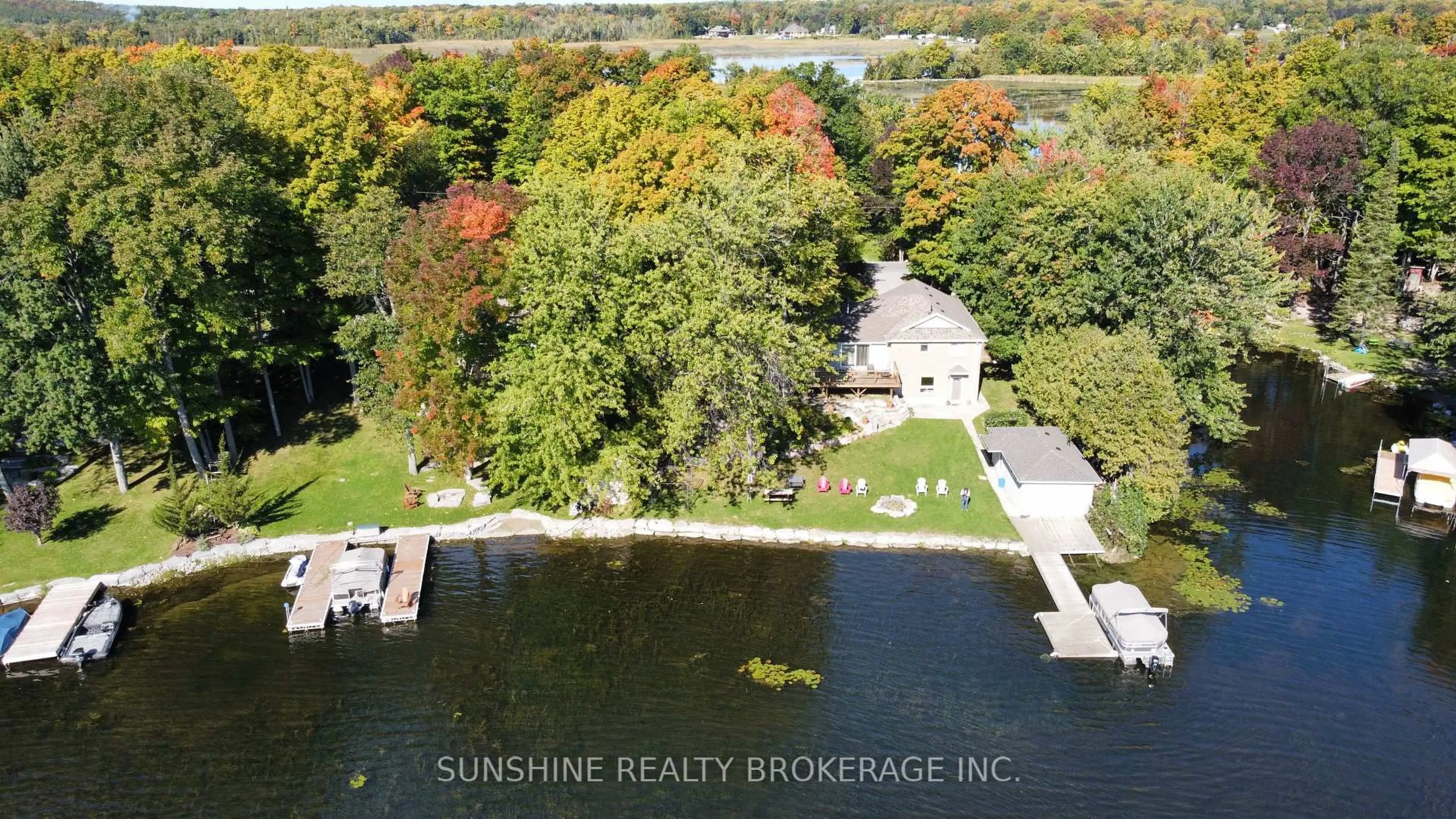 A pic from outside/outdoor area/front of a property/back of a property/a pic from drone, water/lake/river/ocean view for 47 WOODLAND Tr, Trent Lakes Ontario K0L 1J0