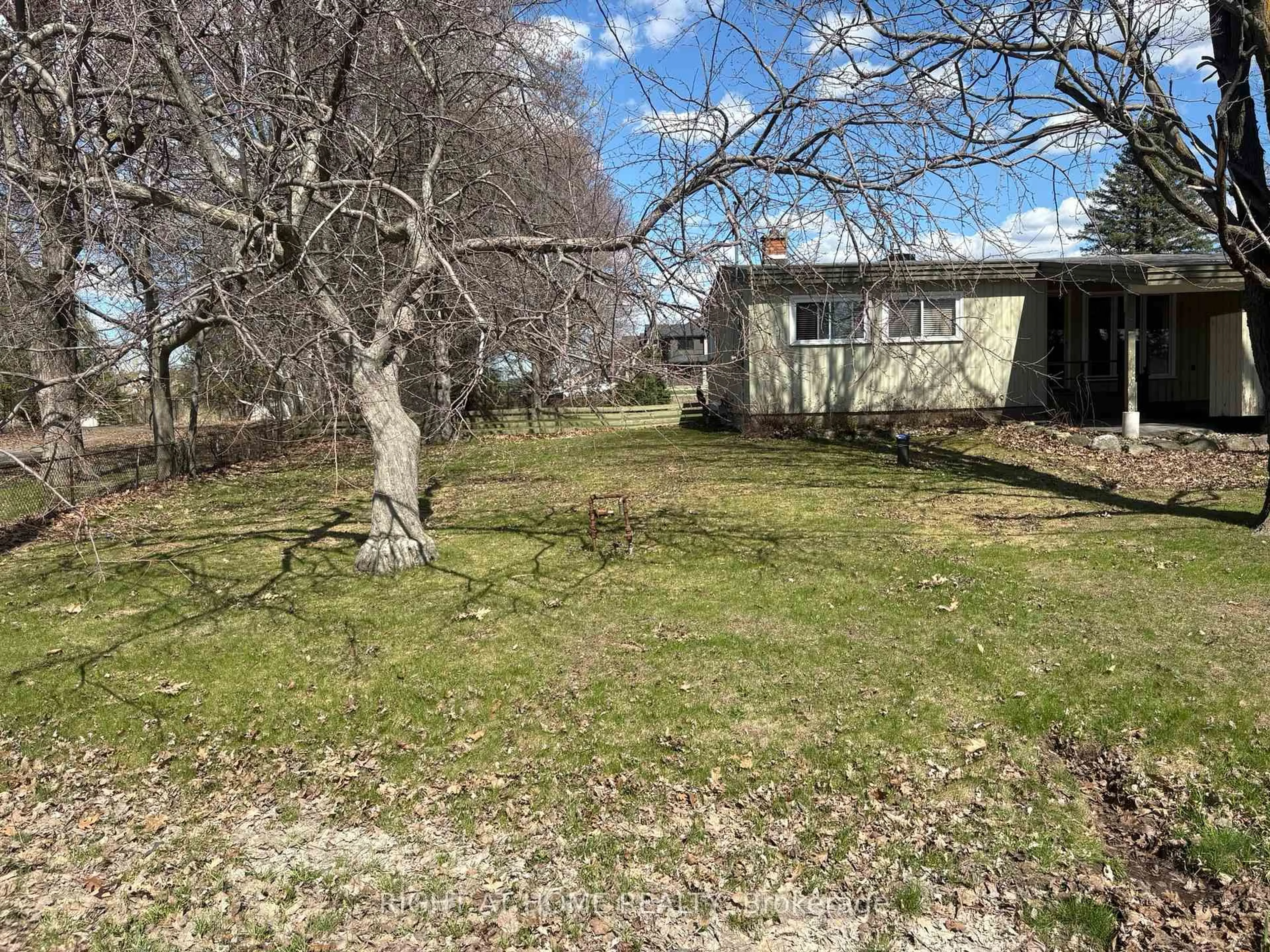 A pic from outside/outdoor area/front of a property/back of a property/a pic from drone, unknown for 793 River Rd, Manotick Ontario K4M 0T9